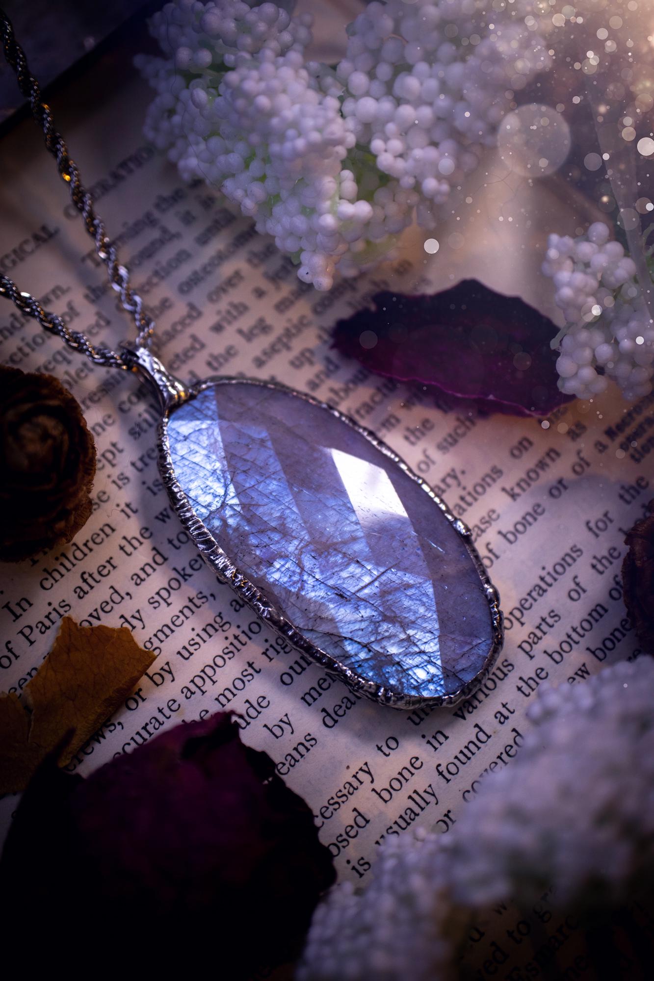 Handmade and beautiful, rose cut, belomorite, soft soldered pendant necklace. This pendant necklace features the most gorgeous and flashy belomorite moonstone crystal, full of glittery shimmer and a deep lovely blue hue. Handcrafted using the soft solder method, also known as the tiffany technique, an ancient technique used to created stained glass windows. The solder used is lead free and totally safe to wear, it contains elements of silver and polishes up to a high lustre. Gothic jewellery