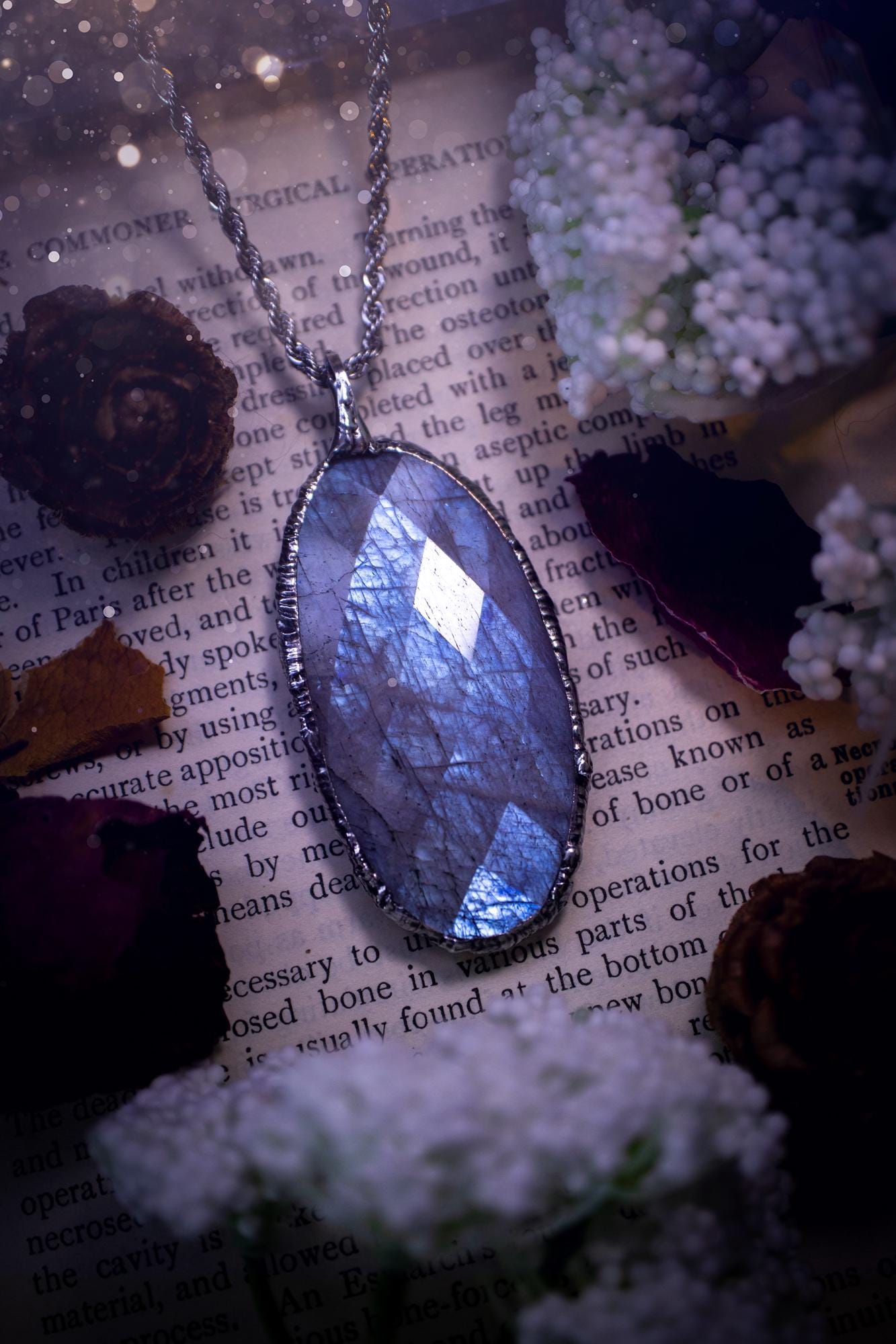 Handmade and beautiful, rose cut, belomorite, soft soldered pendant necklace. This pendant necklace features the most gorgeous and flashy belomorite moonstone crystal, full of glittery shimmer and a deep lovely blue hue. Handcrafted using the soft solder method, also known as the tiffany technique, an ancient technique used to created stained glass windows. The solder used is lead free and totally safe to wear, it contains elements of silver and polishes up to a high lustre. Gothic jewellery