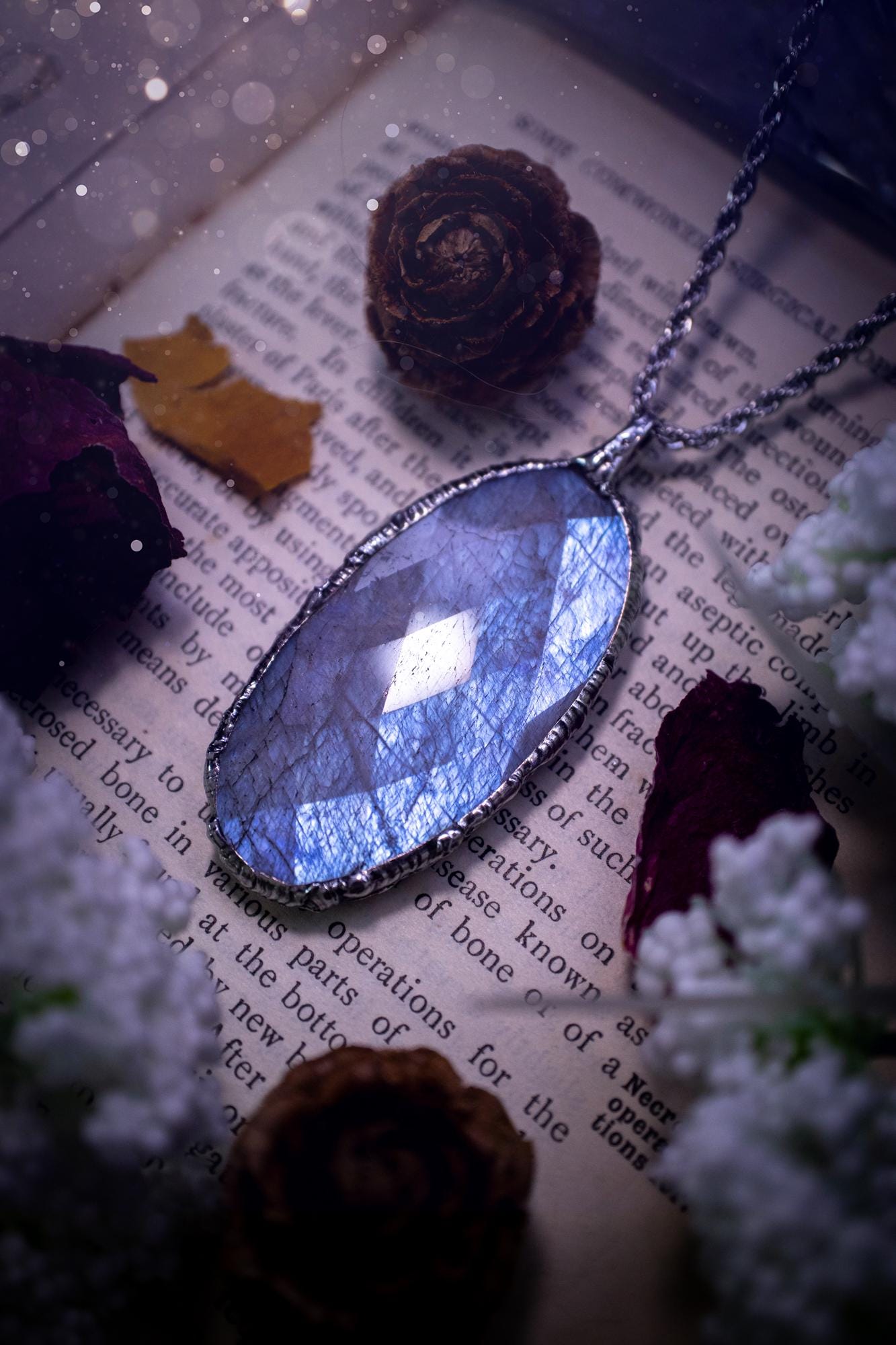 Handmade and beautiful, rose cut, belomorite, soft soldered pendant necklace. This pendant necklace features the most gorgeous and flashy belomorite moonstone crystal, full of glittery shimmer and a deep lovely blue hue. Handcrafted using the soft solder method, also known as the tiffany technique, an ancient technique used to created stained glass windows. The solder used is lead free and totally safe to wear, it contains elements of silver and polishes up to a high lustre. Gothic jewellery