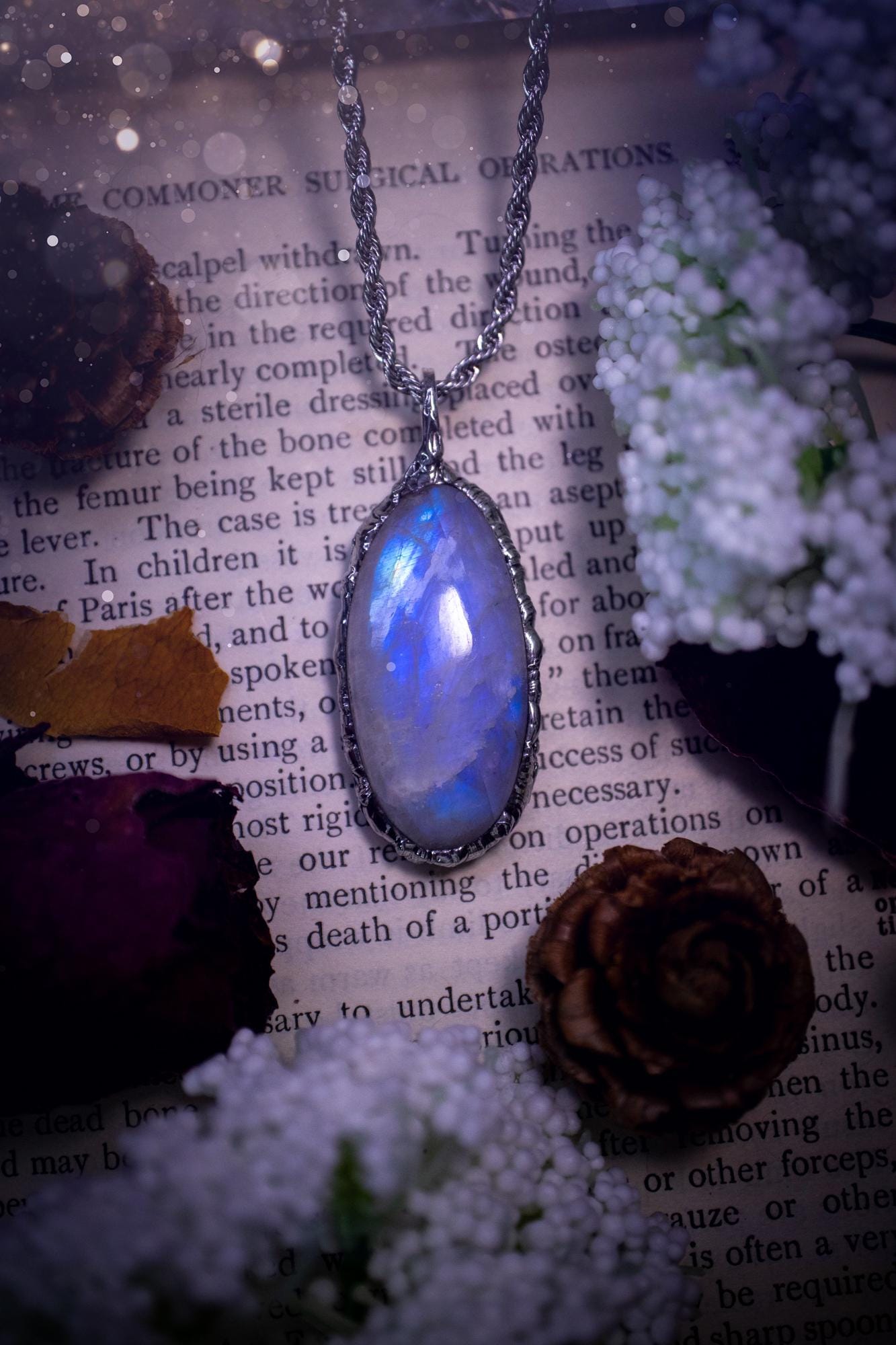 Handmade and beautiful, flashy rainbow moonstone, soft soldered pendant necklace. This pendant necklace features the most gorgeous and flashy rainbow moonstone crystal, full of glittery shimmer and a deep lovely blue hue. Handcrafted using the soft solder method, also known as the tiffany technique, an ancient technique used to created stained glass windows. The solder used is lead free and totally safe to wear, it contains elements of silver and polishes up to a high lustre. Gothic jewellery