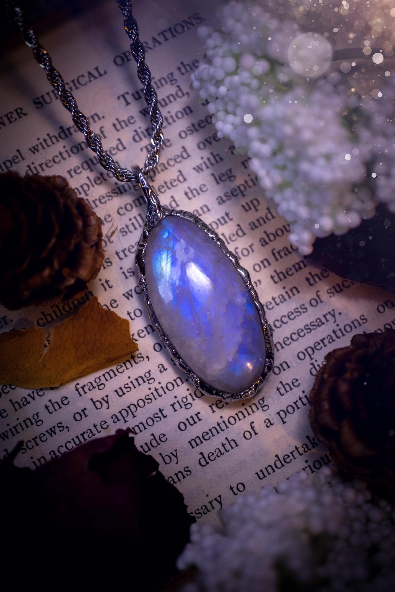 Handmade and beautiful, flashy rainbow moonstone, soft soldered pendant necklace. This pendant necklace features the most gorgeous and flashy rainbow moonstone crystal, full of glittery shimmer and a deep lovely blue hue. Handcrafted using the soft solder method, also known as the tiffany technique, an ancient technique used to created stained glass windows. The solder used is lead free and totally safe to wear, it contains elements of silver and polishes up to a high lustre. Gothic jewellery