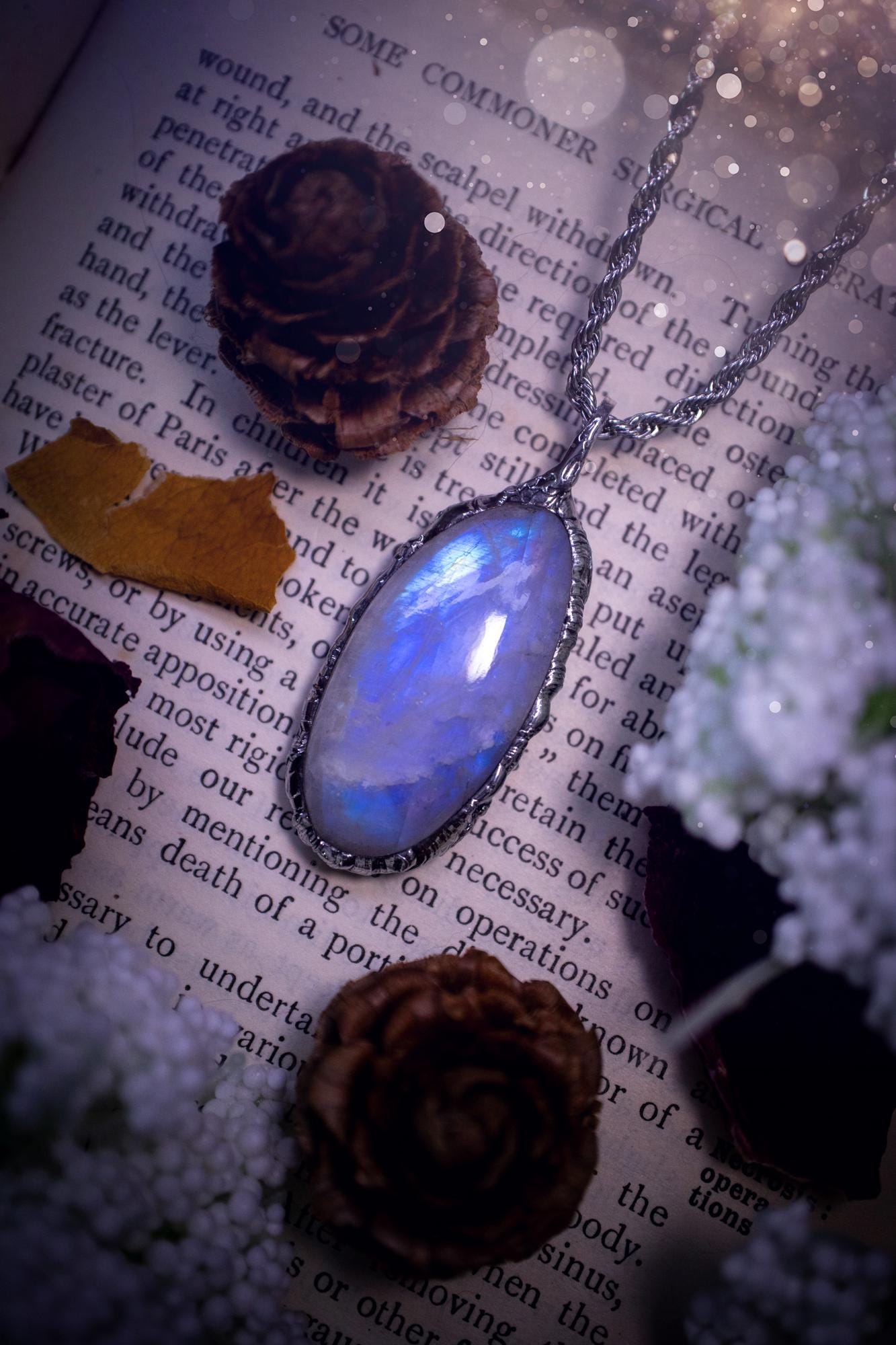 Handmade and beautiful, flashy rainbow moonstone, soft soldered pendant necklace. This pendant necklace features the most gorgeous and flashy rainbow moonstone crystal, full of glittery shimmer and a deep lovely blue hue. Handcrafted using the soft solder method, also known as the tiffany technique, an ancient technique used to created stained glass windows. The solder used is lead free and totally safe to wear, it contains elements of silver and polishes up to a high lustre. Gothic jewellery