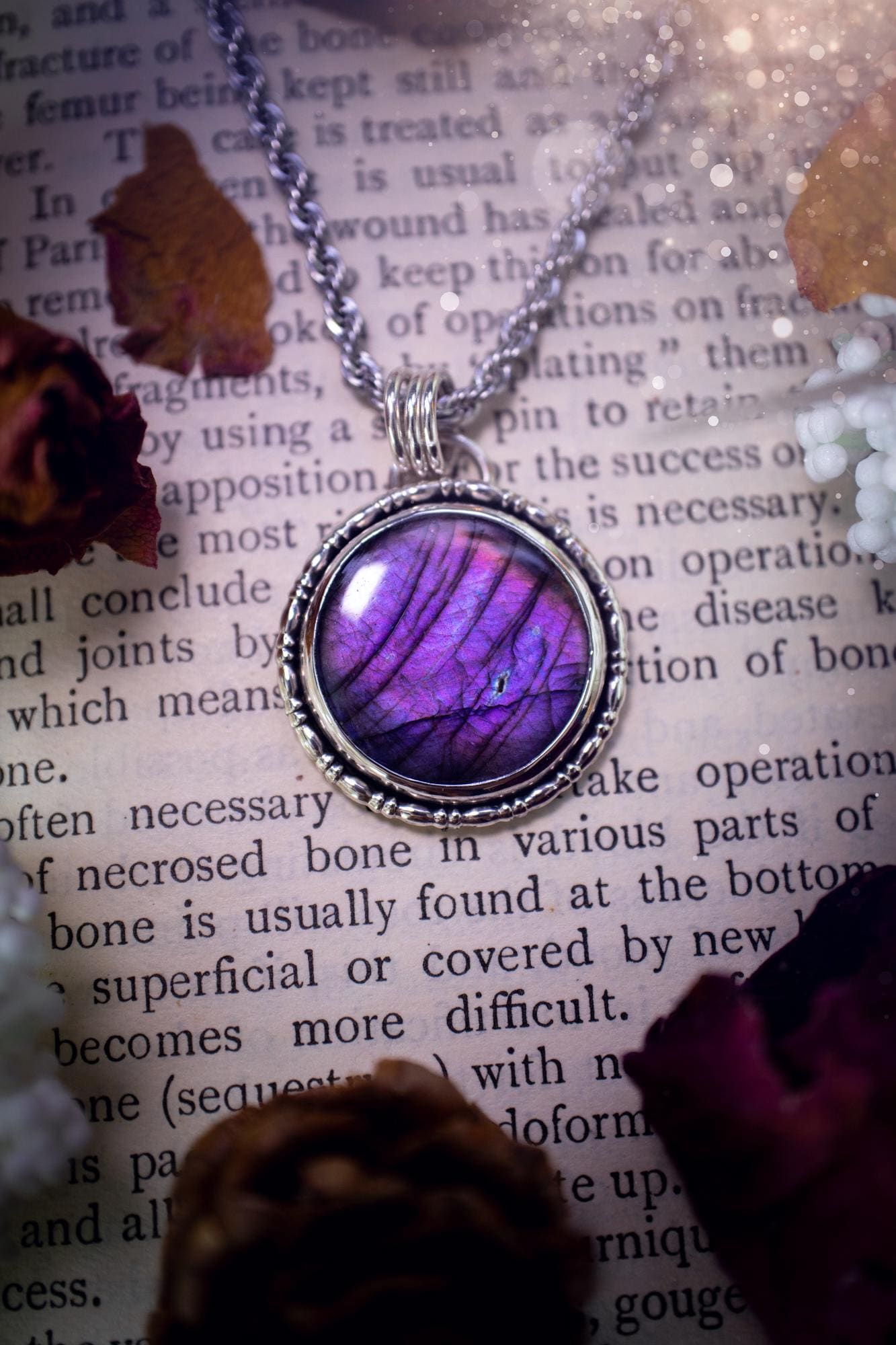 Beautifully handcrafted, deep purple, pink and blue multi-flash labradorite, spectrolite crystal pendant necklace. This stunning crystal pendant has been made using recycled fine and sterling silver. Featuring a stunning and vibrant purple and pink flash labradorite that has the most beautiful stripey patterns within. This crystal pendant would be an ideal gift for any crystal or jewellery lover, which has the a mix of hippy and witch vibes!