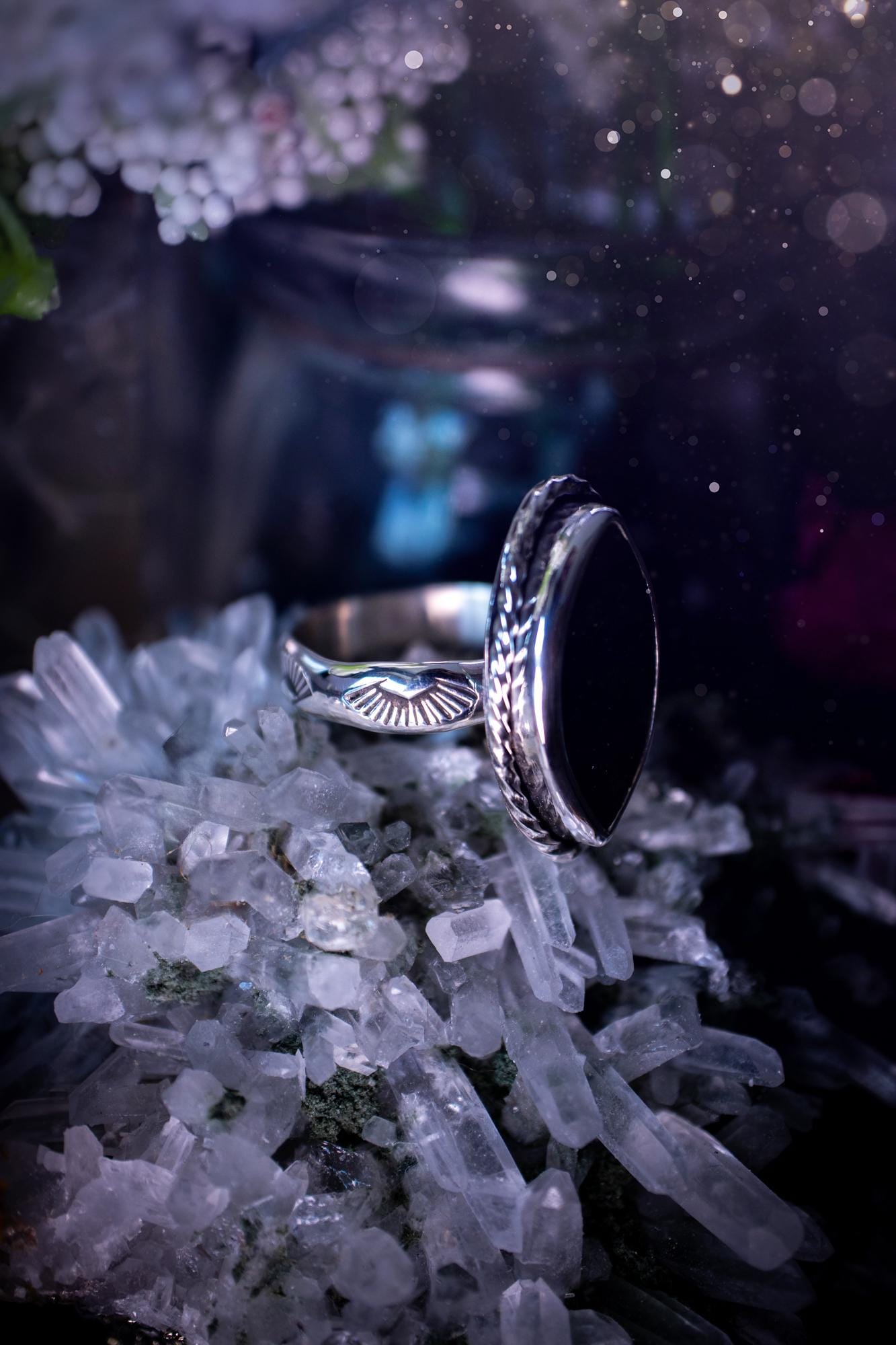 Handcrafted sterling silver statement ring featuring a stunning spectrolite labradorite crystal with vibrant flashes of purple, pink, and orange. This magical gemstone shimmers with an ethereal glow, making it a captivating piece for any jewellery collection. Ideal for crystal lovers, spiritual souls, and those drawn to unique, one-of-a-kind designs. A bold, mystical accessory perfect for expressing your inner light and energy. Gothic and handmade jewellery gifts, ideal for crystal lovers.
