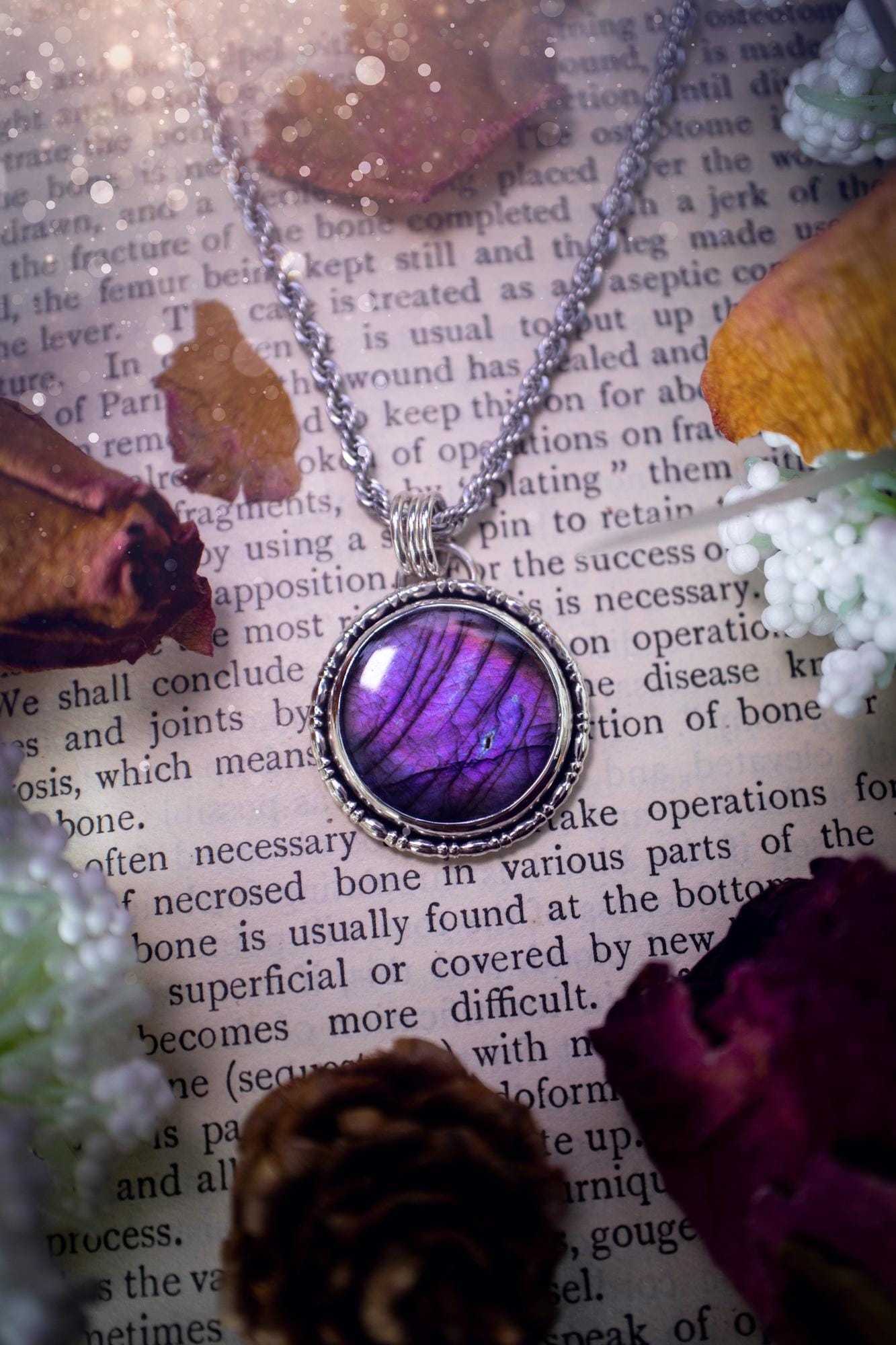 Beautifully handcrafted, deep purple, pink and blue multi-flash labradorite, spectrolite crystal pendant necklace. This stunning crystal pendant has been made using recycled fine and sterling silver. Featuring a stunning and vibrant purple and pink flash labradorite that has the most beautiful stripey patterns within. This crystal pendant would be an ideal gift for any crystal or jewellery lover, which has the a mix of hippy and witch vibes!