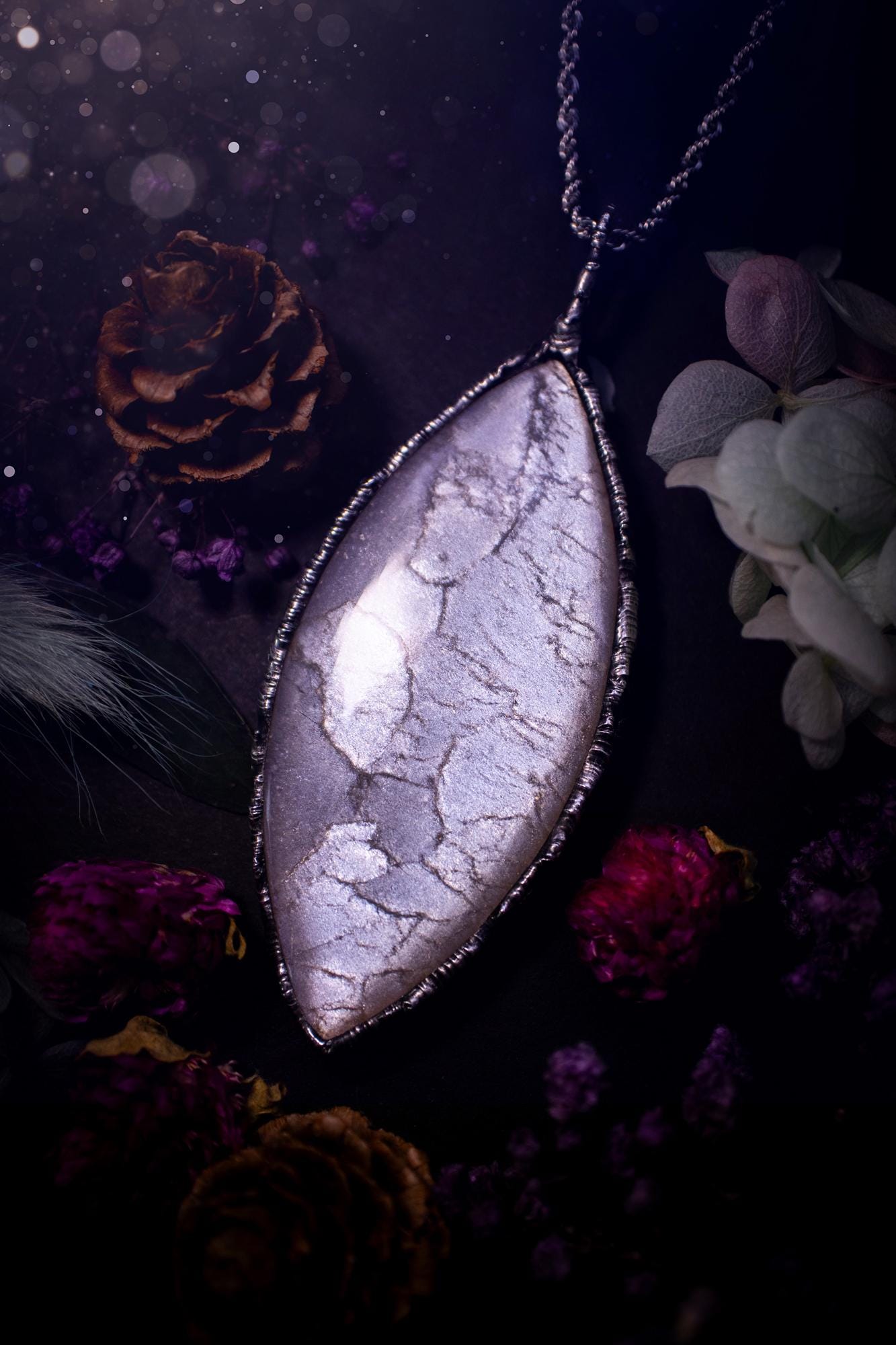 Handmade and beautiful, flashy, grey, soft soldered pendant necklace. This pendant necklace features the most gorgeous and flashy grey moonstone crystal, full of glittery shimmer and a deep lovely silvery grey hue. Handcrafted using the soft solder method, also known as the tiffany technique, an ancient technique used to created stained glass windows. The solder used is lead free and totally safe to wear, it contains elements of silver and polishes up to a high lustre. Gothic witchy jewellery