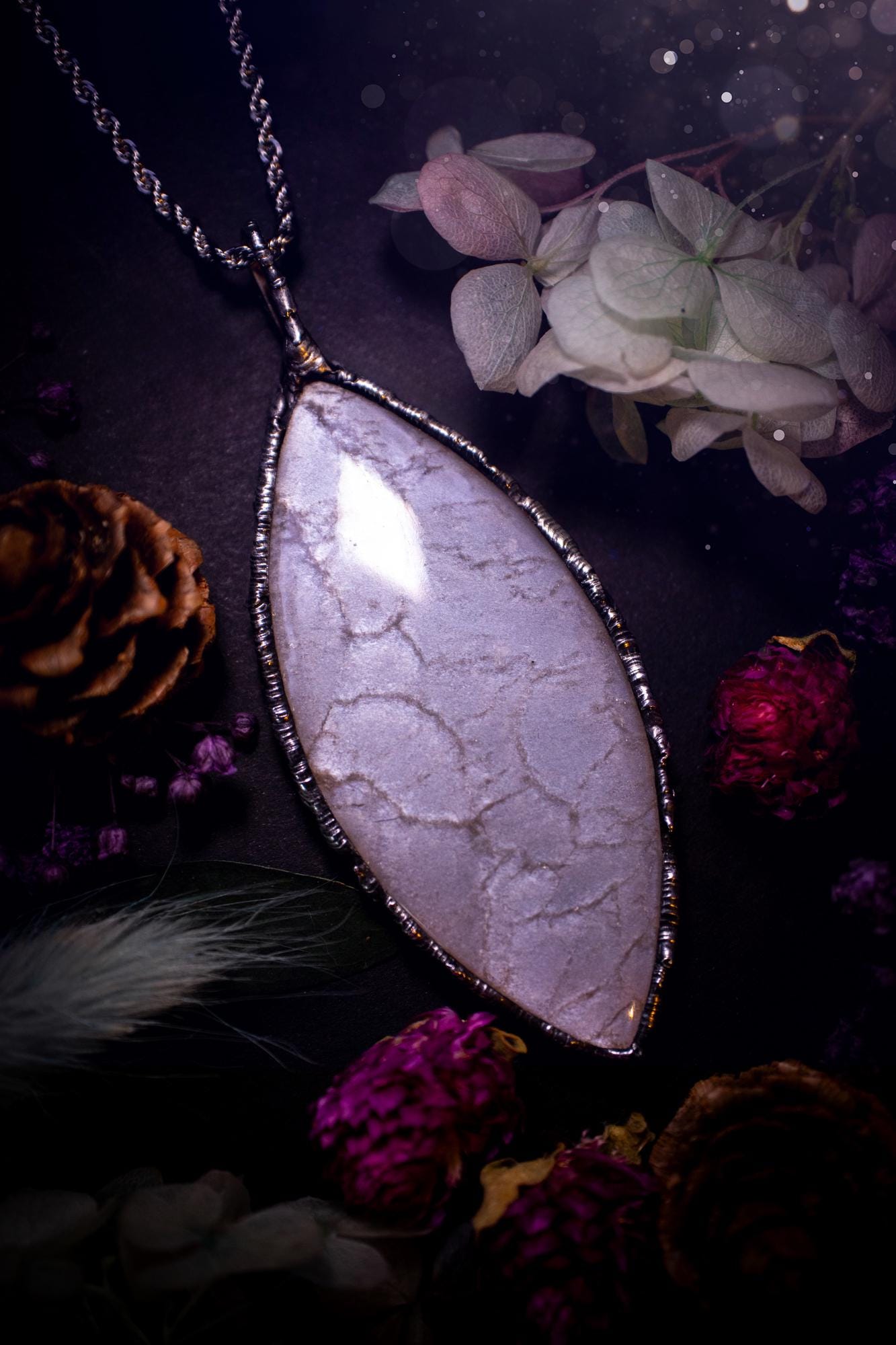 Handmade and beautiful, flashy, grey, soft soldered pendant necklace. This pendant necklace features the most gorgeous and flashy grey moonstone crystal, full of glittery shimmer and a deep lovely silvery grey hue. Handcrafted using the soft solder method, also known as the tiffany technique, an ancient technique used to created stained glass windows. The solder used is lead free and totally safe to wear, it contains elements of silver and polishes up to a high lustre. Gothic witchy jewellery