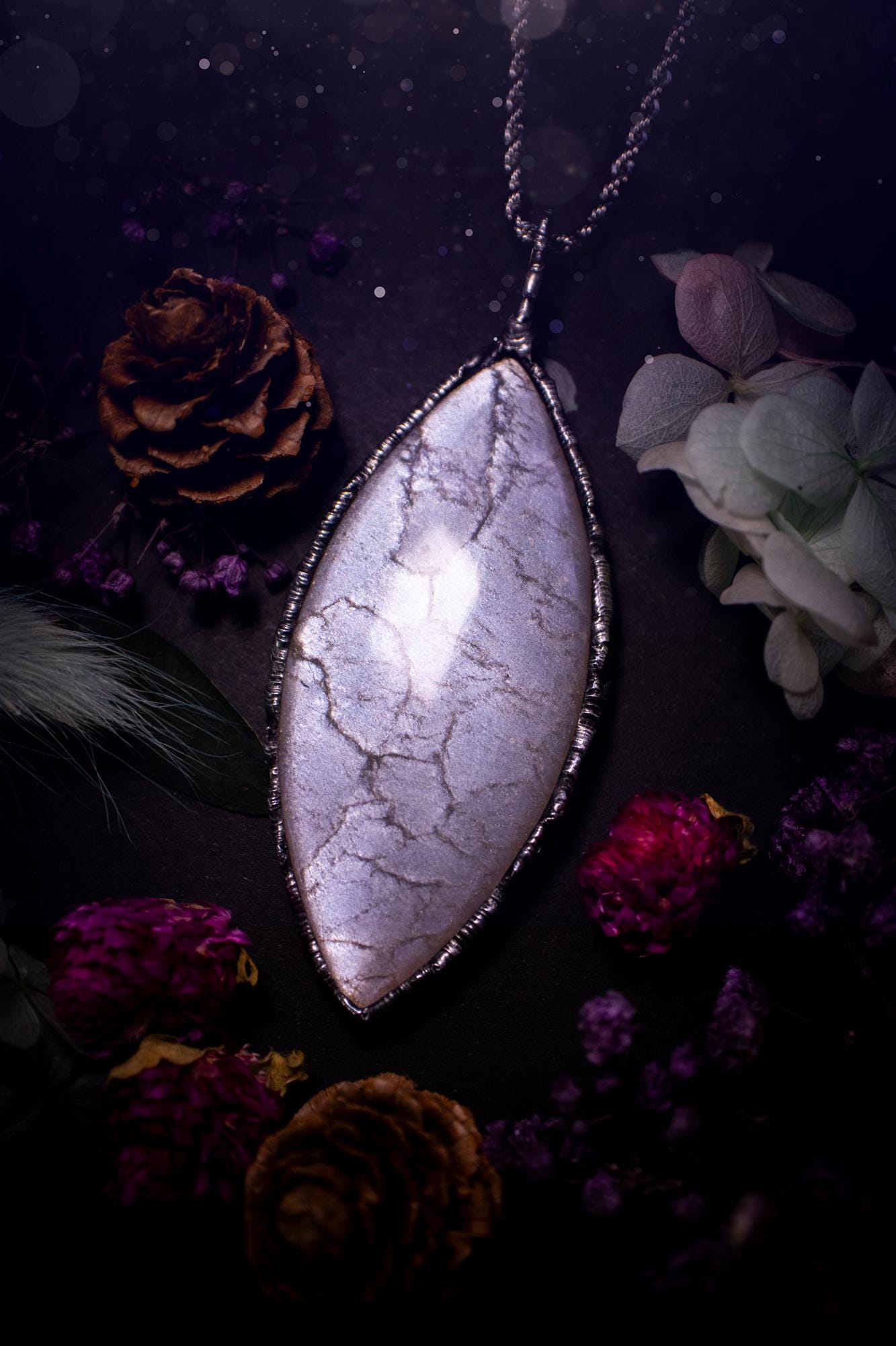 Handmade and beautiful, flashy, grey, soft soldered pendant necklace. This pendant necklace features the most gorgeous and flashy grey moonstone crystal, full of glittery shimmer and a deep lovely silvery grey hue. Handcrafted using the soft solder method, also known as the tiffany technique, an ancient technique used to created stained glass windows. The solder used is lead free and totally safe to wear, it contains elements of silver and polishes up to a high lustre. Gothic witchy jewellery