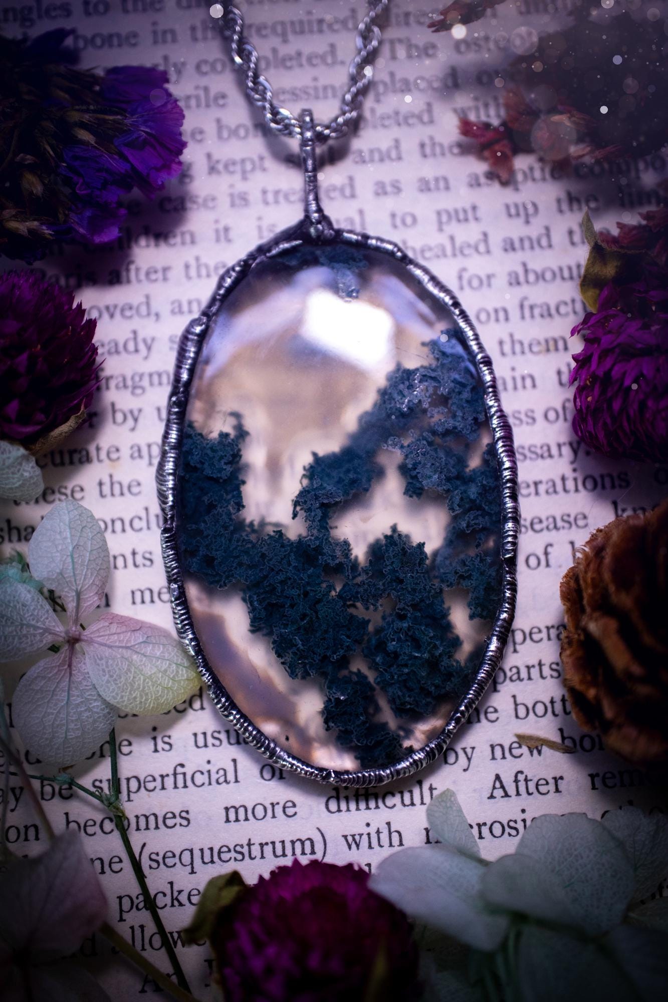 Absolutely stunning, and totally unique, moss agate crystal, soft soldered pendant necklace. This beautiful pendant features a very high quality moss agate crystal that has beautiful mossy definition and patterns. The crystal looks like it has a little forest captured inside. This pendant has been made using the soft solder method also known as the tiffany technique. This piece of jewellery would be ideal for any jewellery or crystal lover and is full of hippy, gothic and witchy goodness!