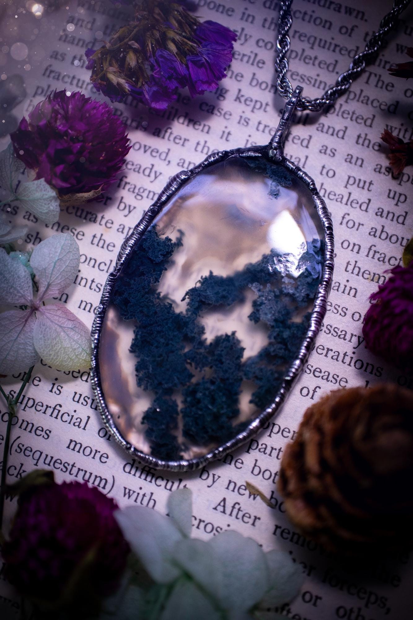 Absolutely stunning, and totally unique, moss agate crystal, soft soldered pendant necklace. This beautiful pendant features a very high quality moss agate crystal that has beautiful mossy definition and patterns. The crystal looks like it has a little forest captured inside. This pendant has been made using the soft solder method also known as the tiffany technique. This piece of jewellery would be ideal for any jewellery or crystal lover and is full of hippy, gothic and witchy goodness!