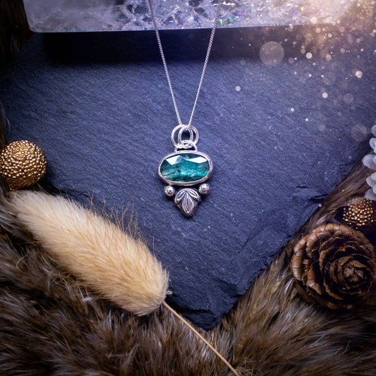 Made to order - Stunning, handmade, Teal Kyanite crystal, sterling silver pendant. Teal Kyanite pendant made to order and handmade by myself with love and care. It features a beautiful, rose cut, natural teal, kyanite gemstone that has an array of sea greens, blues and a gorgeous sparkle! Ideal gift for jewellery lover