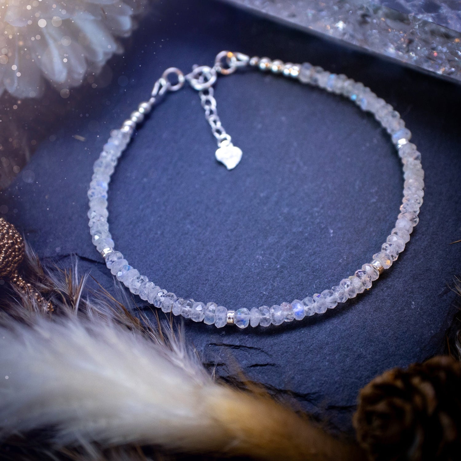 Beautiful handmade rainbow moonstone crystal bracelet. This bracelet has been strung using high quality 49 strand beading wire, in a choice of findings such as sterling silver and gold filled.