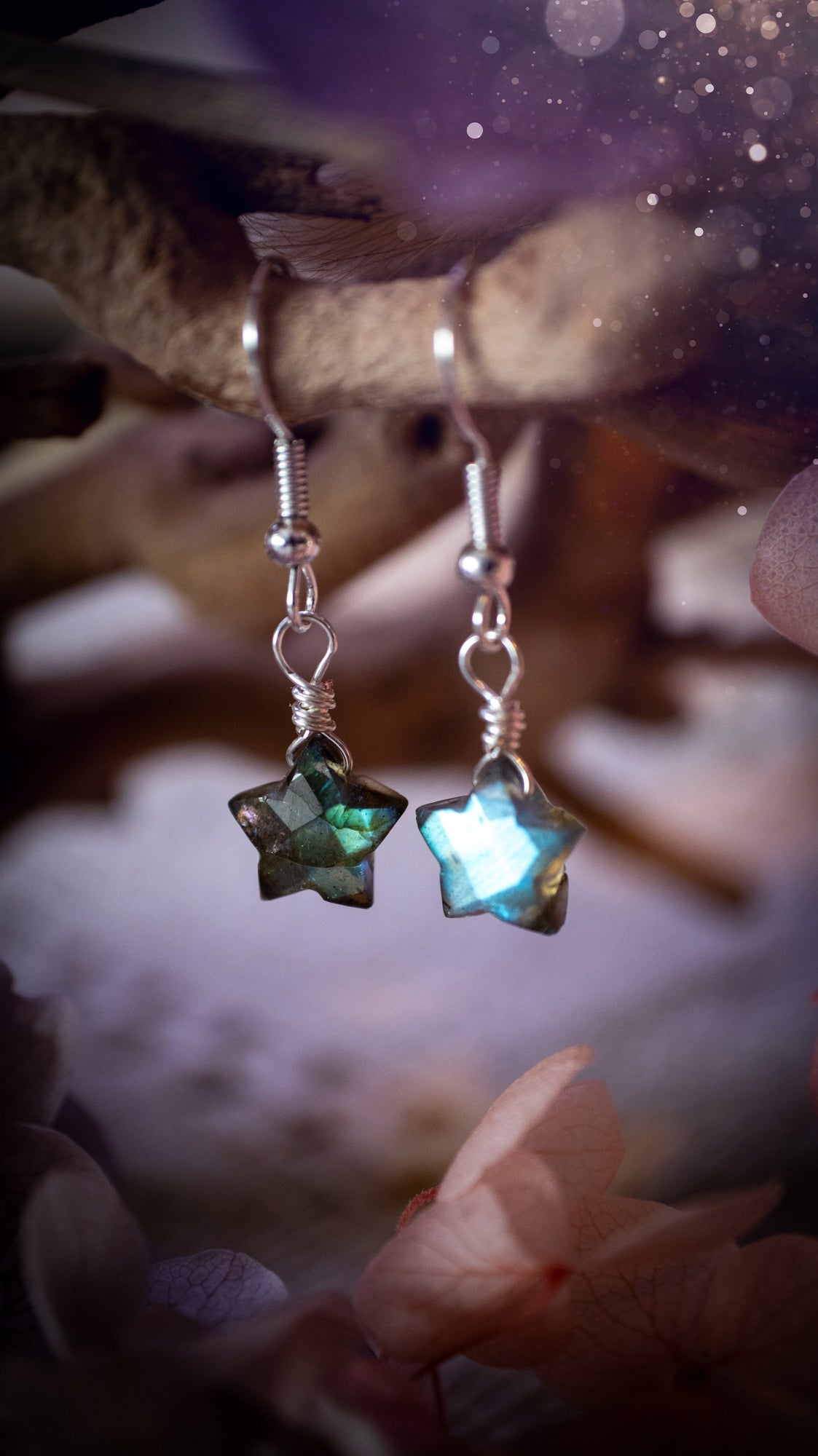 Handcrafted crystal gemstone earrings made with sterling silver and fine silver, featuring ethically sourced natural stones in delicate and statement designs. Unique bohemian and gothic-inspired earrings for everyday wear and special occasions.