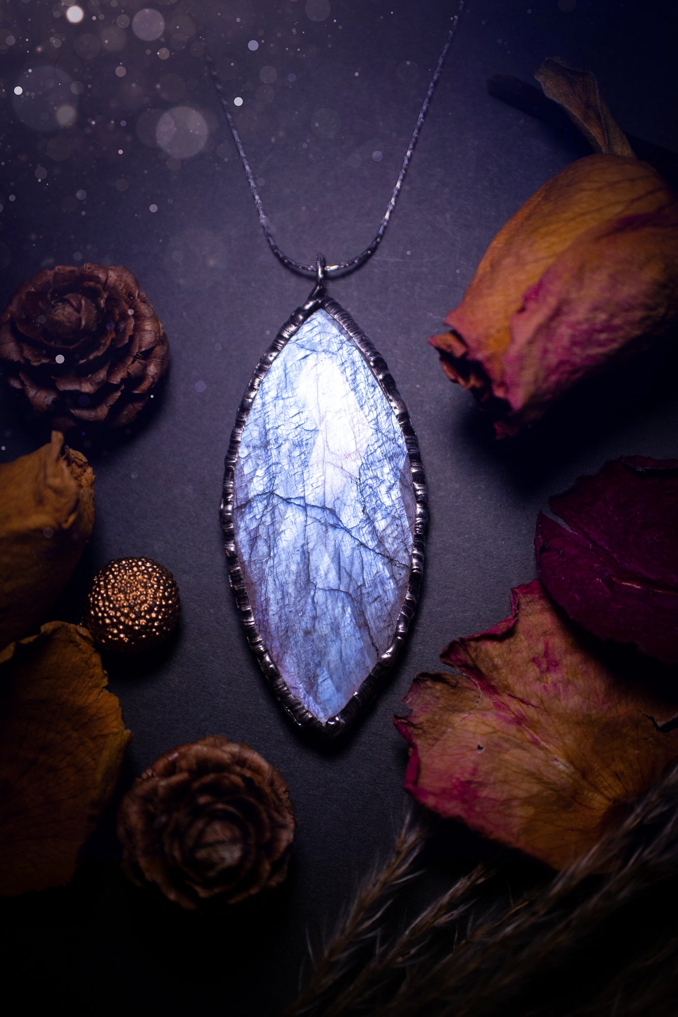 One of a kind, belomorite soft soldered pendant necklace. This pendant has been made using the tiffany technique and is made with lead free solder. The bezel is then polished to a high shine. Ideal gifts for goths, hippies and crystal lovers. Flashy.