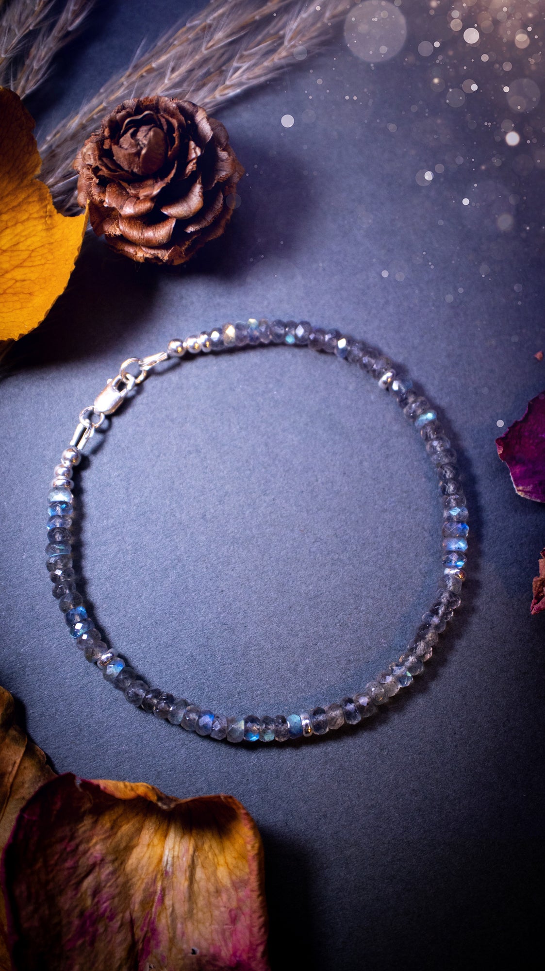 Handmade, made-to-order labradorite crystal bracelets featuring natural, flashy stones with vibrant iridescent colours. Each bracelet is crafted with high-quality labradorite beads, showcasing a unique play of blue, green, and gold hues, adding an elegant and mystical touch. Ideal crystal lover gifts.