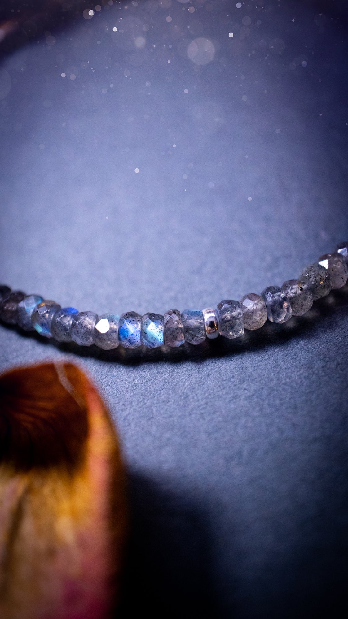 Handmade, made-to-order labradorite crystal bracelets featuring natural, flashy stones with vibrant iridescent colours. Each bracelet is crafted with high-quality labradorite beads, showcasing a unique play of blue, green, and gold hues, adding an elegant and mystical touch. Ideal crystal lover gifts.