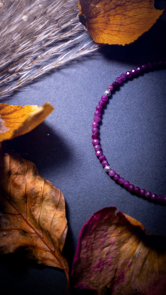 Handmade, made-to-order ruby crystal bracelets featuring natural, vibrant red ruby beads in a stacking style. Crafted with high-quality, rondelle-shaped crystals and customizable findings, each bracelet offers a bold and elegant touch. Ideal crystal gifts.