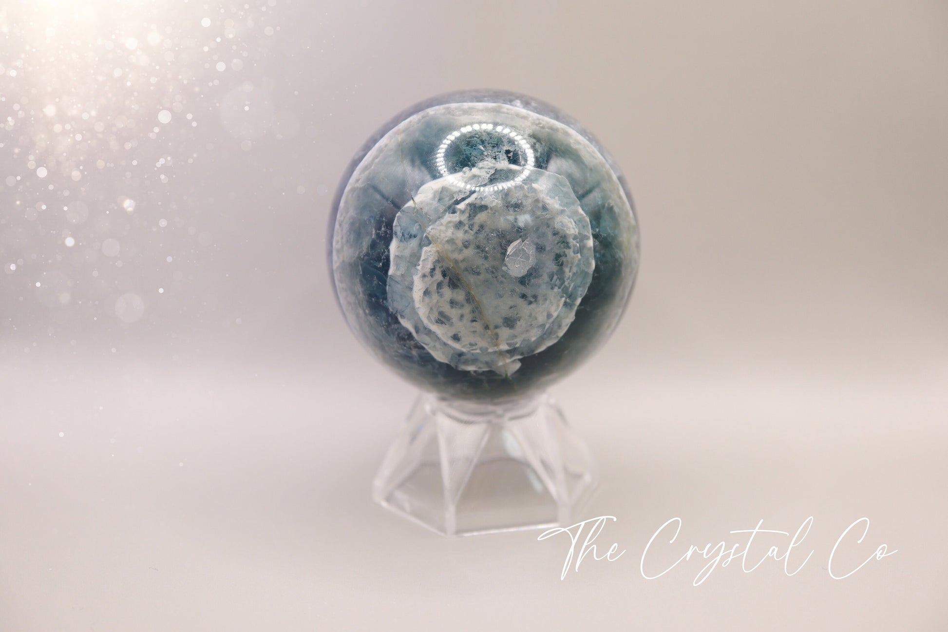 Beautiful real natural crystal, fluorite Sphere. Sizing comes in at 5.9 cm circumference. Weighs 339 grams. Full of beautiful colours and patterns, also has some beautiful rainbows within and feathers. Suitable for meditation, special occasions and gifts. This piece would make the ideal gift for a crystal lover.