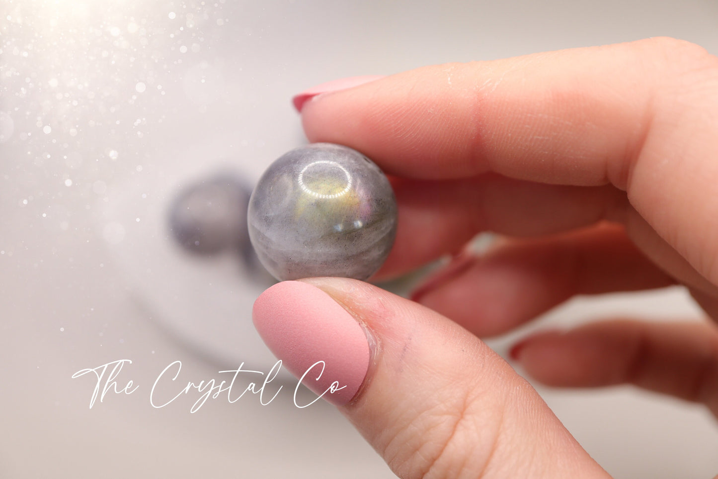 Small sized, labradorite mini crystal spheres. These crystal gemstone spheres are made from natural Labradorite and are very flashy in colour. An array of blues, purples and oranges. Ideal as a pocket crystal and gifting to crystal lovers.