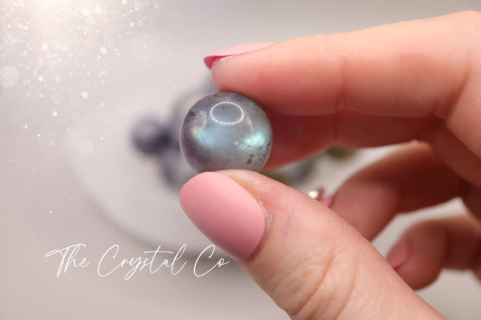 Small sized, labradorite mini crystal spheres. These crystal gemstone spheres are made from natural Labradorite and are very flashy in colour. An array of blues, purples and oranges. Ideal as a pocket crystal and gifting to crystal lovers.