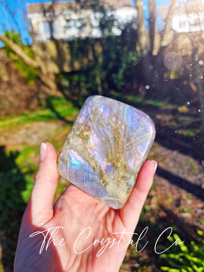 Stunning and natural, purple, pink, orange and blue flash spectrolite labradorite, crystal freeform. This crystal is totally natural and has the most insane flash from various angles. Ideal for meditation and healing purposes and for home décor.