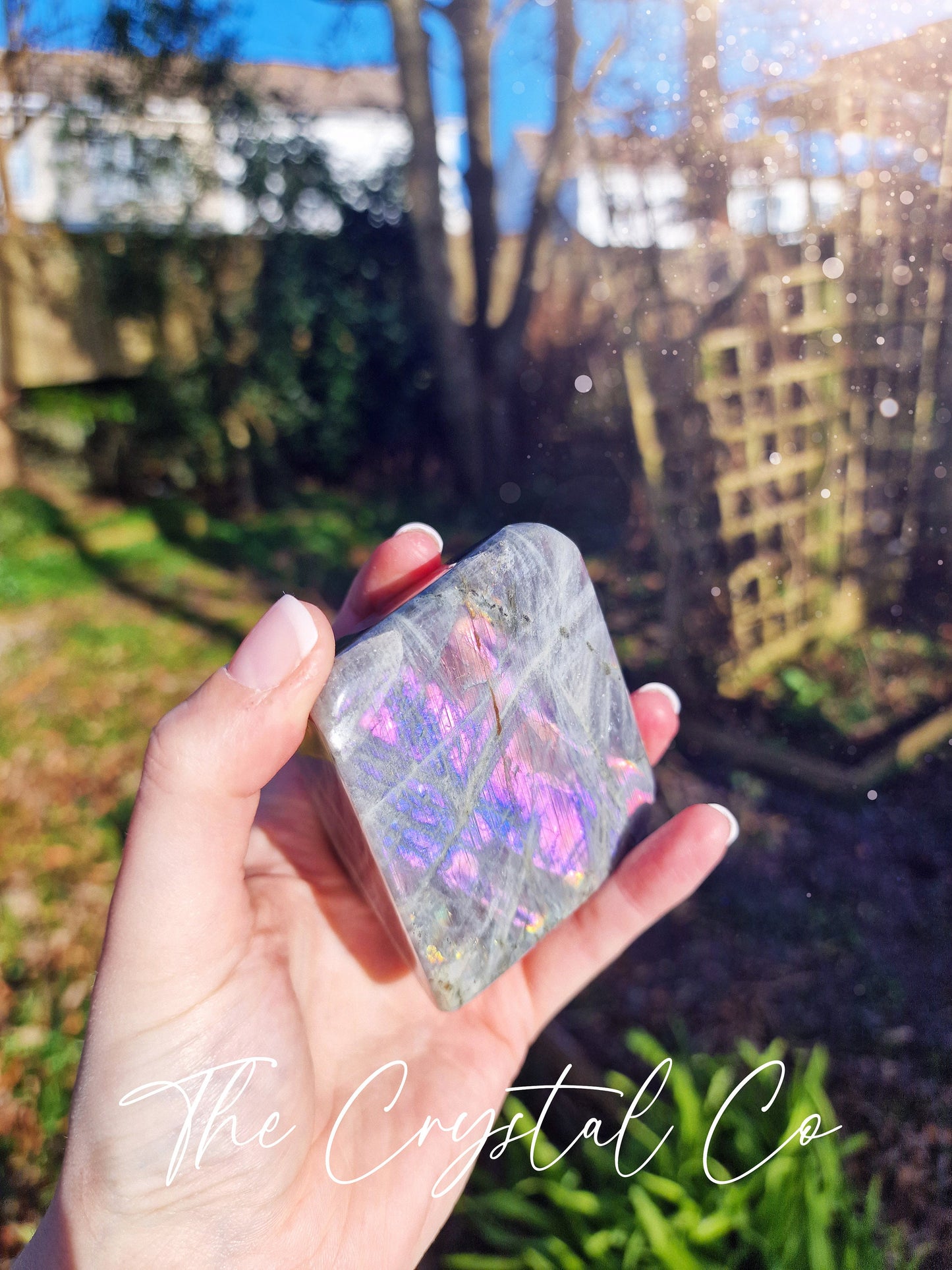 Stunning and natural, purple, pink, orange and blue flash spectrolite labradorite, crystal freeform. This crystal is totally natural and has the most insane flash from various angles. Ideal for meditation and healing, and gifts for him or her.