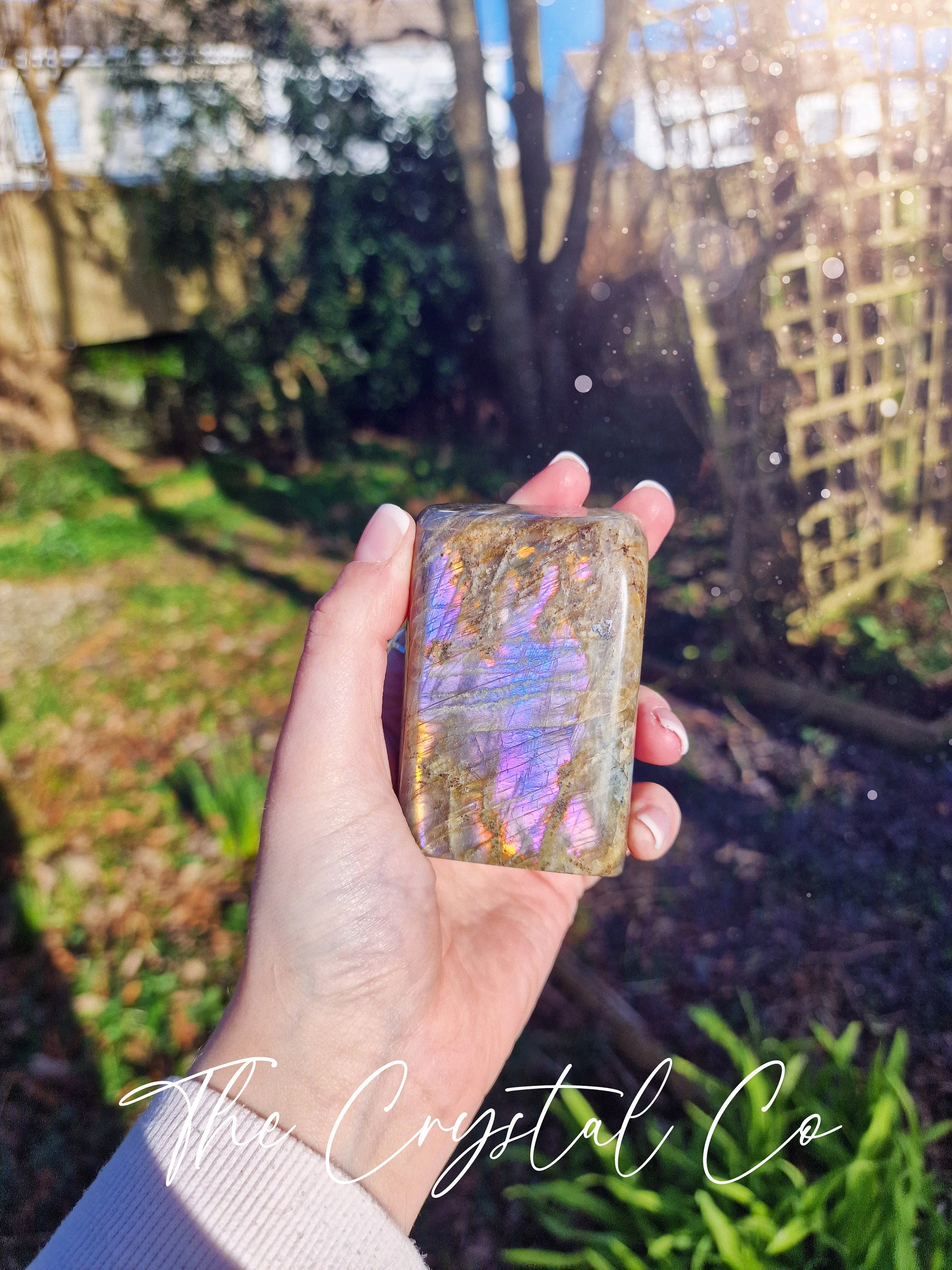 Stunning and natural, purple, pink, orange and blue flash spectrolite labradorite, crystal freeform. This crystal is totally natural and has the most insane flash from various angles. Ideal for meditation and healing, and gifts for him or her.