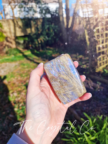 Stunning and natural, purple, pink, orange and blue flash spectrolite labradorite, crystal freeform. This crystal is totally natural and has the most insane flash from various angles. Ideal for meditation and healing, and gifts for him or her.