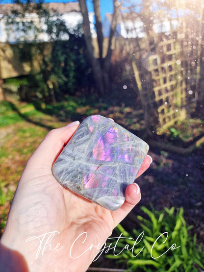 Stunning and natural, purple, pink, orange and blue flash spectrolite labradorite, crystal freeform. This crystal is totally natural and has the most insane flash from various angles. Ideal for meditation and healing, and gifts for him or her.