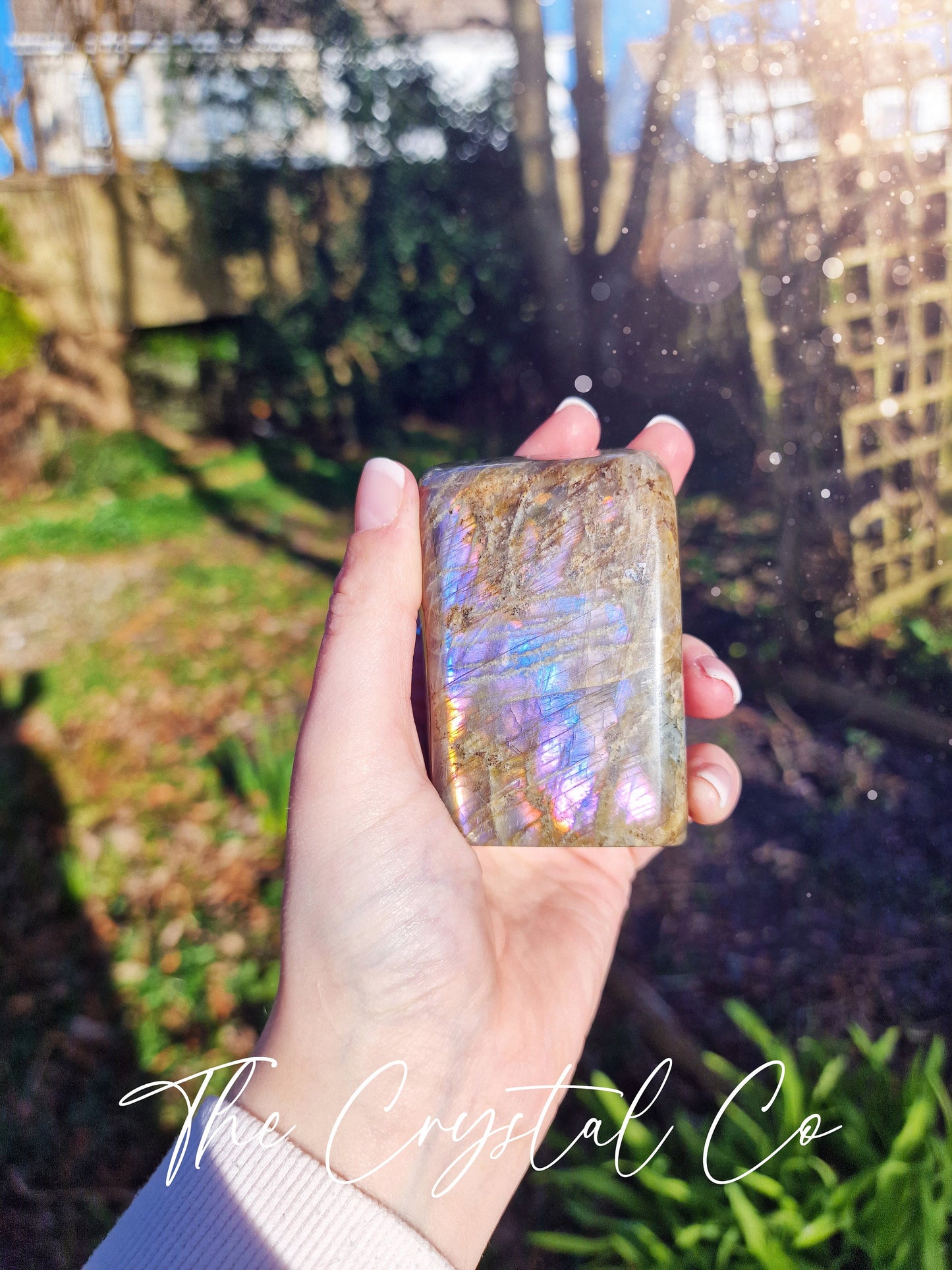 Stunning and natural, purple, pink, orange and blue flash spectrolite labradorite, crystal freeform. This crystal is totally natural and has the most insane flash from various angles. Ideal for meditation and healing, and gifts for him or her.