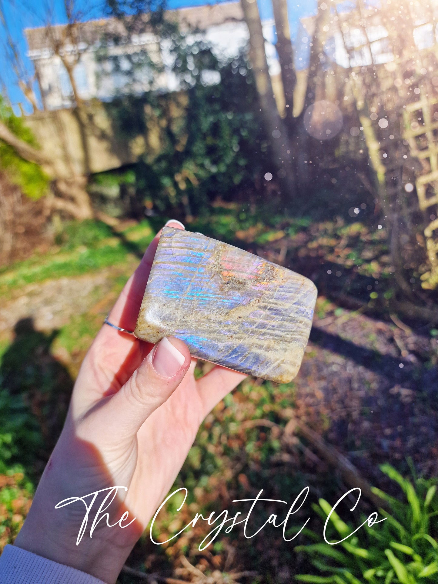 Stunning and natural, purple, pink, orange and blue flash spectrolite labradorite, crystal freeform. This crystal is totally natural and has the most insane flash from various angles. Ideal for meditation and healing, and gifts for him or her.