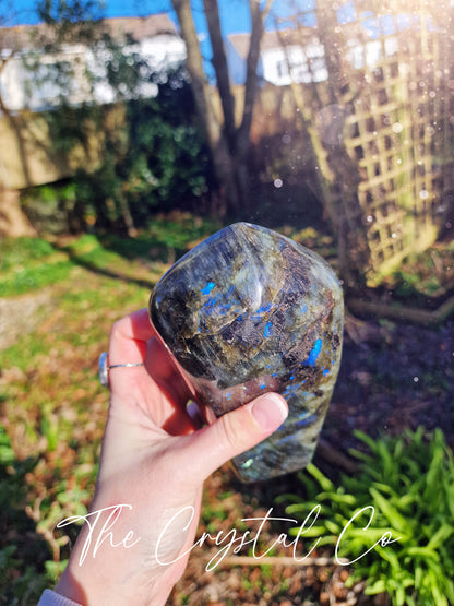 Beautiful Labradorite natural crystal freeform. This beautiful labradorite is full of flash, with multiple  colours of blue, greens and yellows. Ideal for crystal lovers and meditation purposes