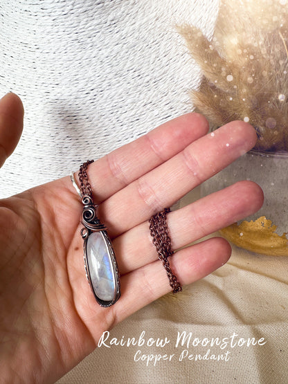 Beautifully hand wrapped, rainbow moonstone, copper pendant necklace. This pendant features a beautiful rainbow moonstone which is the birthstone for June. Wrapped in copper wire into a gorgeous pendant. Ideal for crystal and jewellery lovers. Gothic