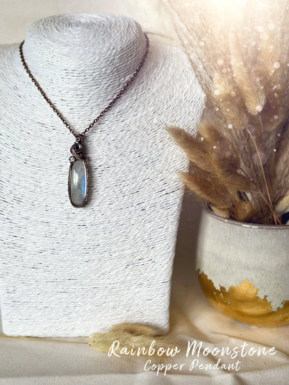 Beautifully hand wrapped, rainbow moonstone, copper pendant necklace. This pendant features a beautiful rainbow moonstone which is the birthstone for June. Wrapped in copper wire into a gorgeous pendant. Ideal for crystal and jewellery lovers. Gothic