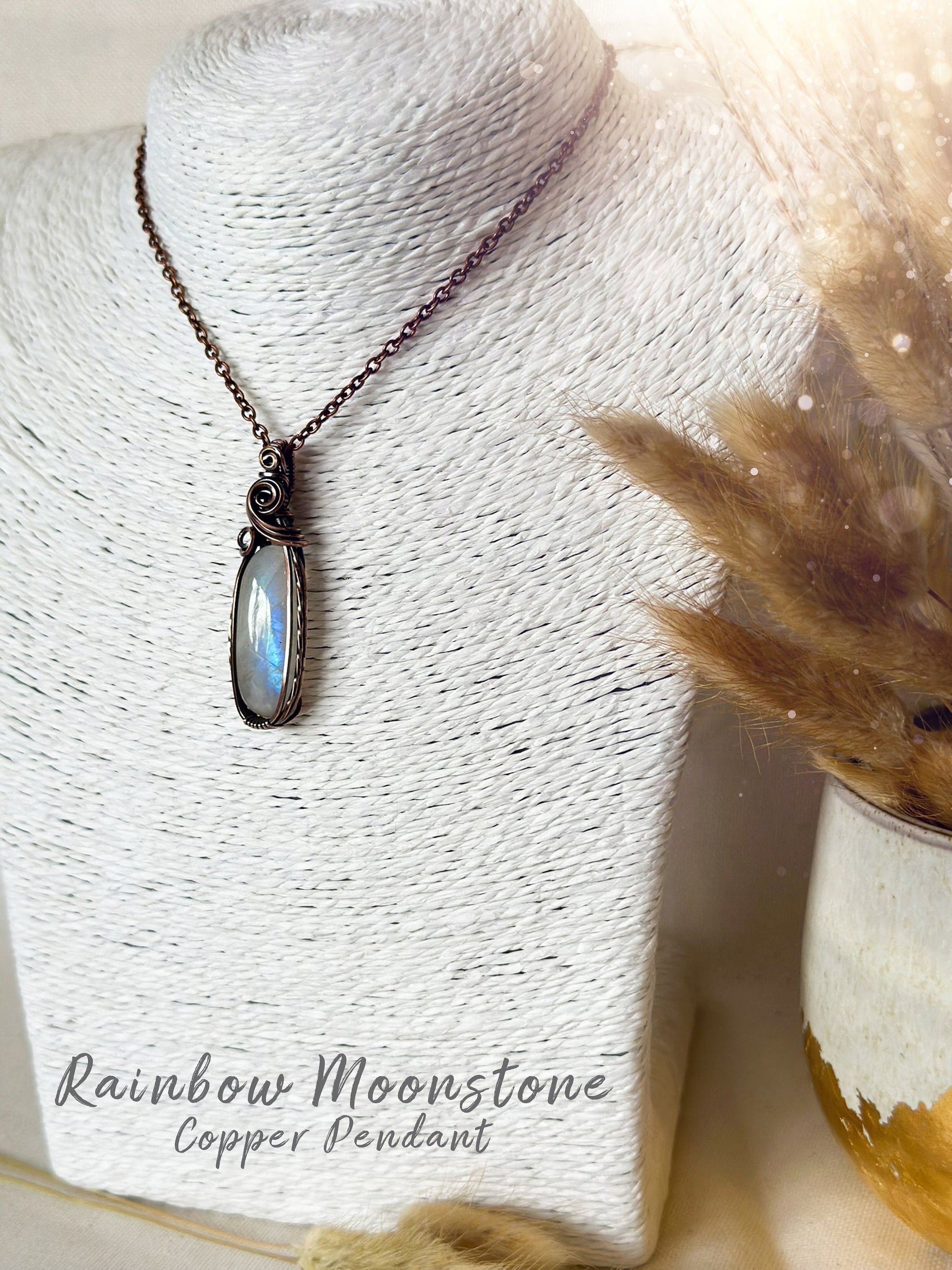 Beautifully hand wrapped, rainbow moonstone, copper pendant necklace. This pendant features a beautiful rainbow moonstone which is the birthstone for June. Wrapped in copper wire into a gorgeous pendant. Ideal for crystal and jewellery lovers. Gothic