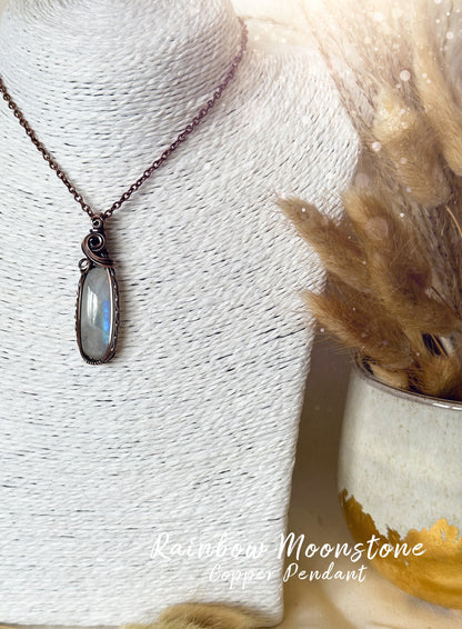 Beautifully hand wrapped, rainbow moonstone, copper pendant necklace. This pendant features a beautiful rainbow moonstone which is the birthstone for June. Wrapped in copper wire into a gorgeous pendant. Ideal for crystal and jewellery lovers. Gothic