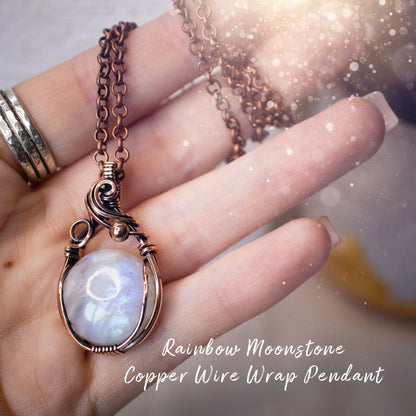 This is a one of a kind, handmade copper wire wrap pendant which features a natural flashy rainbow moonstone crystal. The rainbow moonstone crystal has a beautiful blue flash from different angles and compliments the highly polished, antiqued copper wire which shines luxury! Ideal gift for special occasions