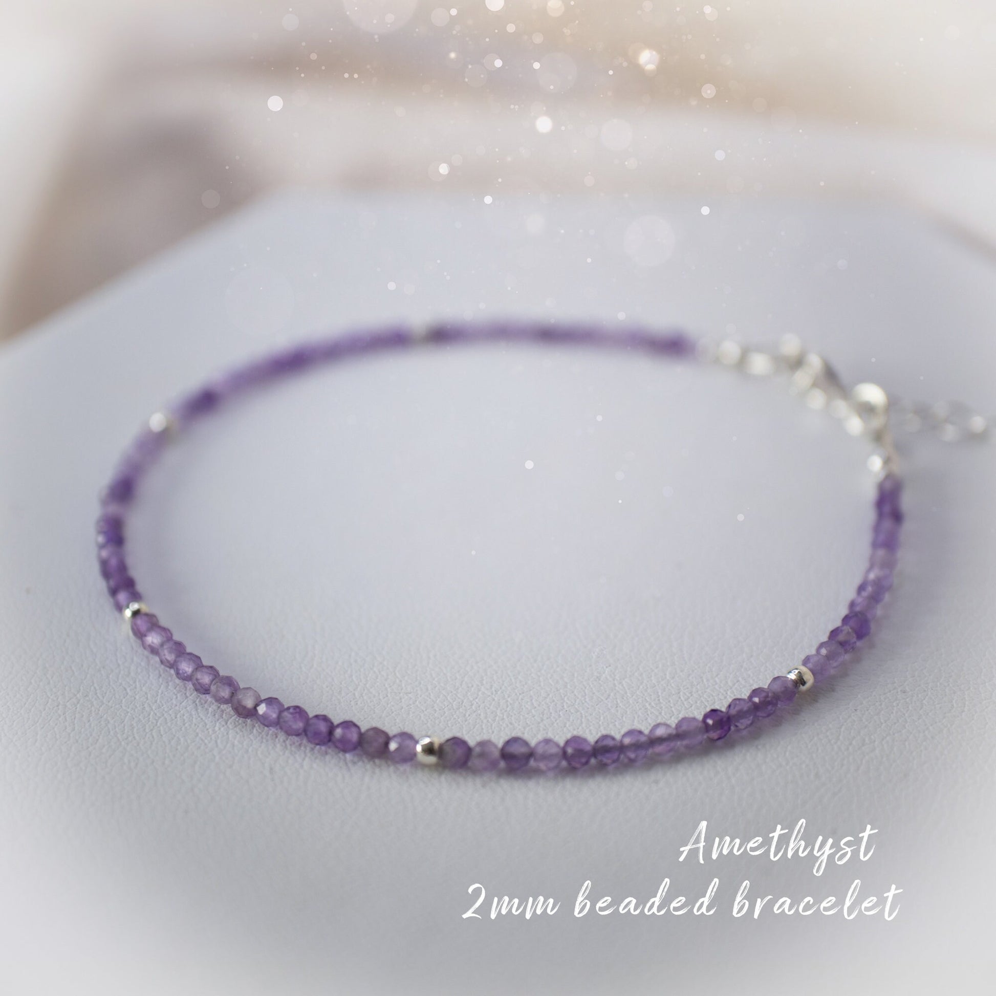 Beautiful 2mm beaded amethyst bracelet. Made from natural crystal stones, available with a choice of findings, sterling silver, rose gold filled and gold filled.