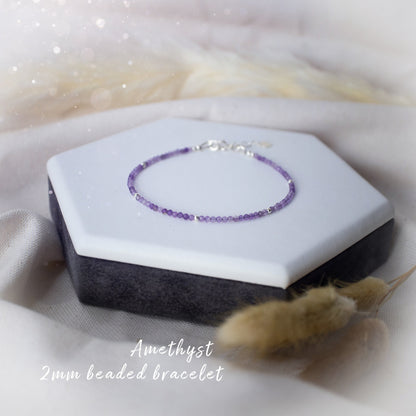 Beautiful 2mm beaded amethyst bracelet. Made from natural crystal stones, available with a choice of findings, sterling silver, rose gold filled and gold filled.