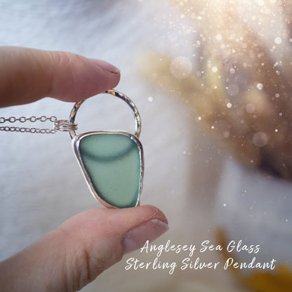 Beautiful deep green sea glass pendant set in 925 sterling silver and 999 fine silver. Featuring sea glass which has been hand picked off the local beaches in Anglesey North Wales