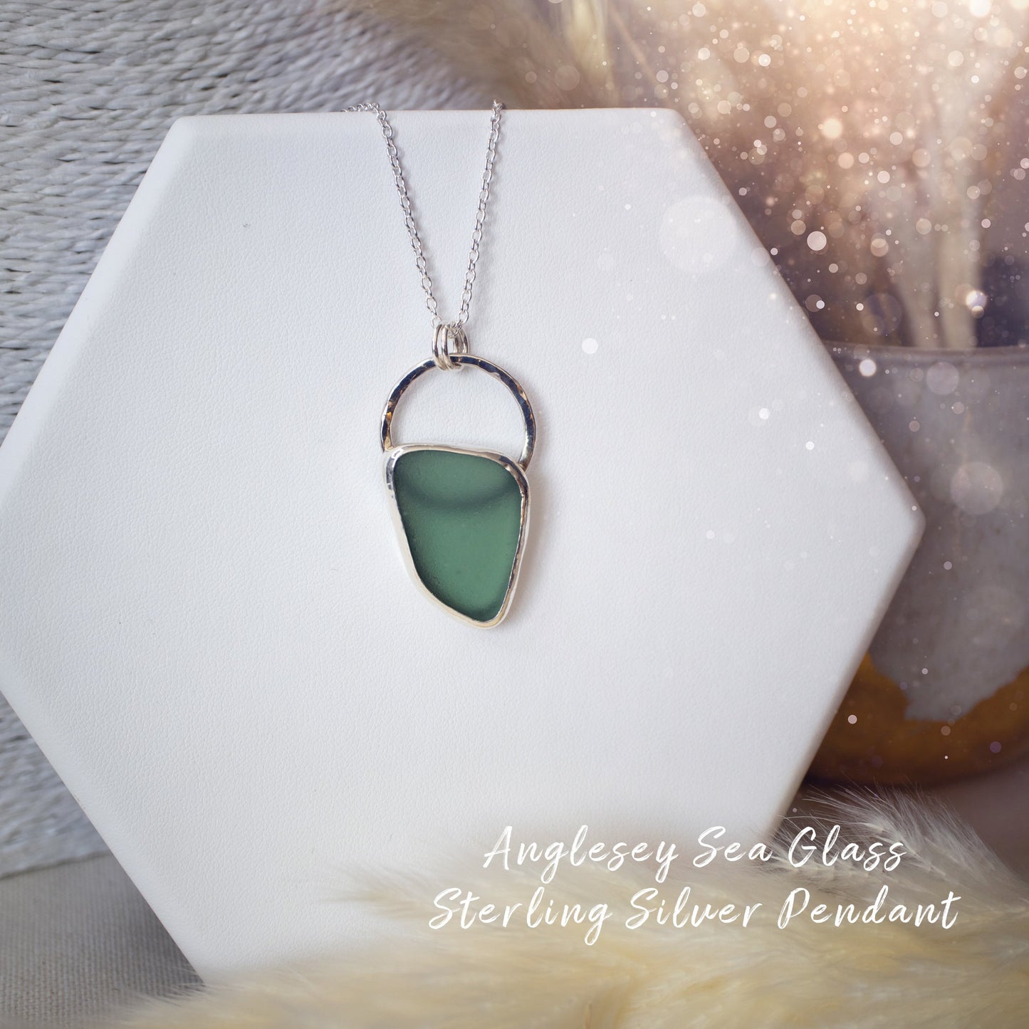 Beautiful deep green sea glass pendant set in 925 sterling silver and 999 fine silver. Featuring sea glass which has been hand picked off the local beaches in Anglesey North Wales. Great Gift