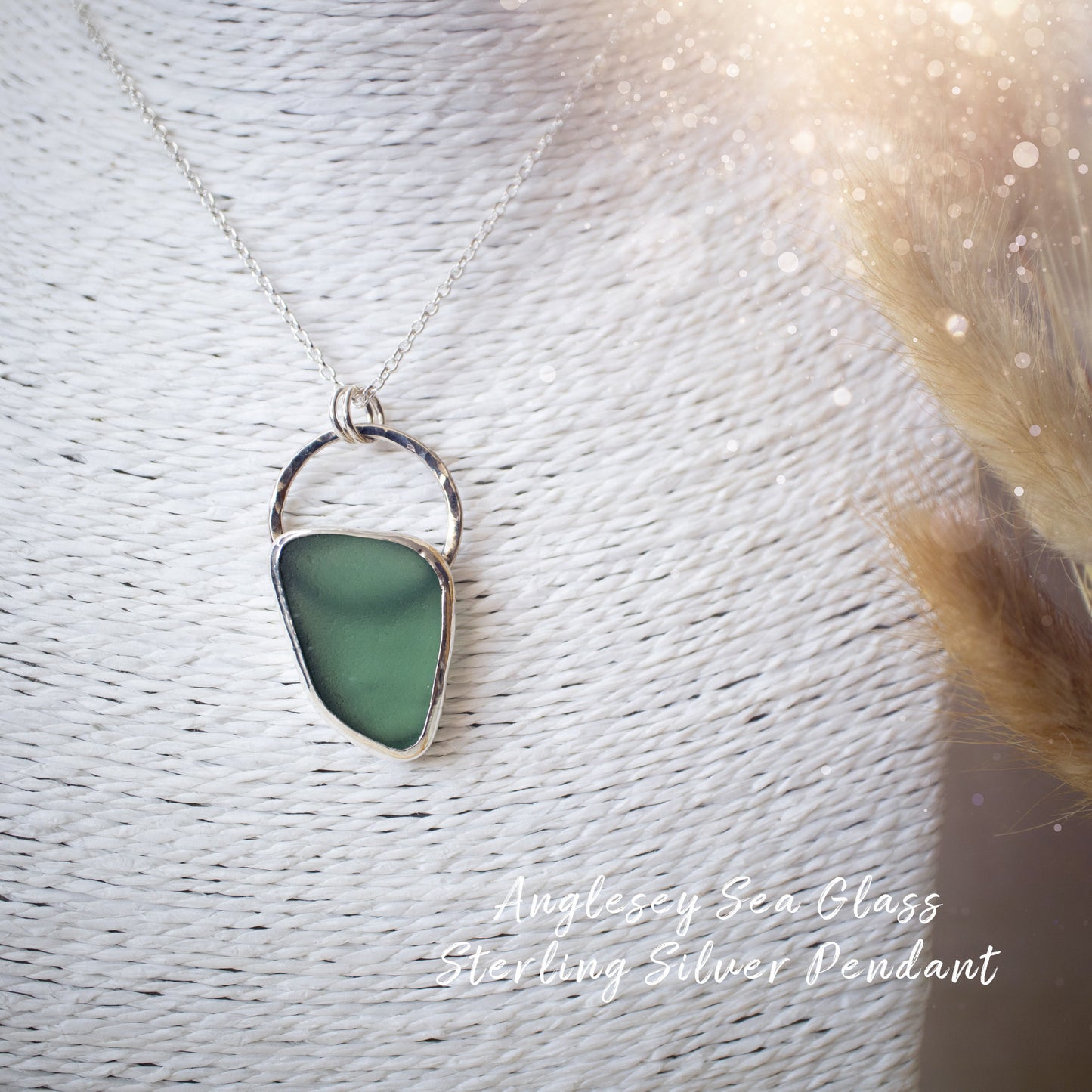 Beautiful deep green sea glass pendant set in 925 sterling silver and 999 fine silver. Featuring sea glass which has been hand picked off the local beaches in Anglesey North Wales