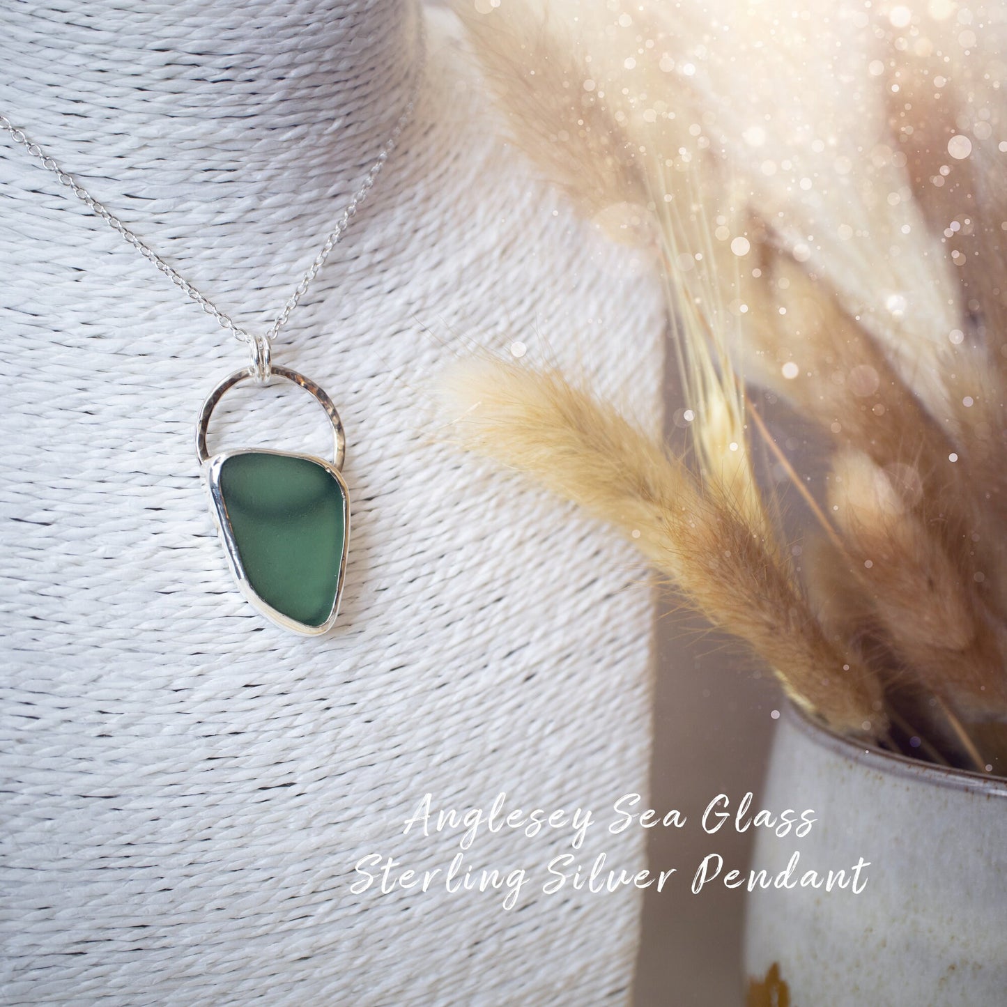 Beautiful deep green sea glass pendant set in 925 sterling silver and 999 fine silver. Featuring sea glass which has been hand picked off the local beaches in Anglesey North Wales