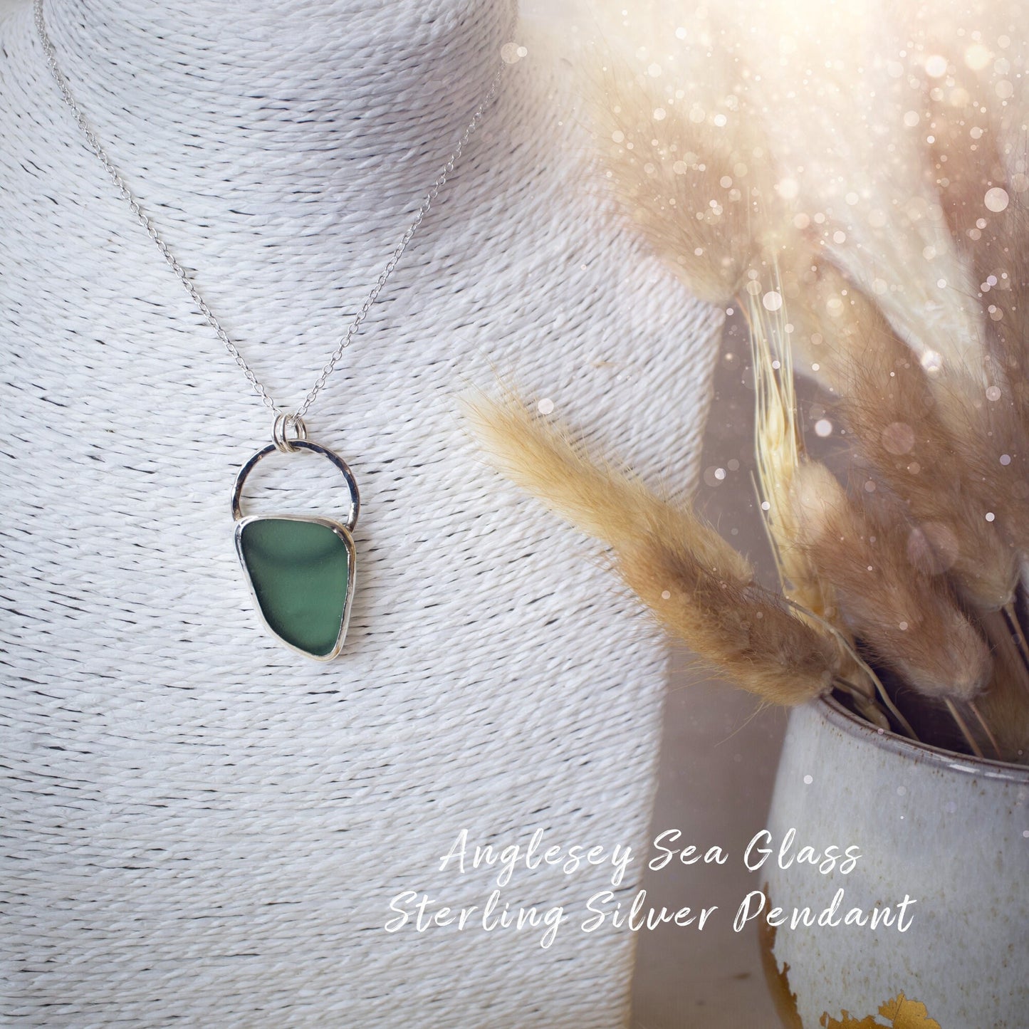 Beautiful deep green sea glass pendant set in 925 sterling silver and 999 fine silver. Featuring sea glass which has been hand picked off the local beaches in Anglesey North Wales