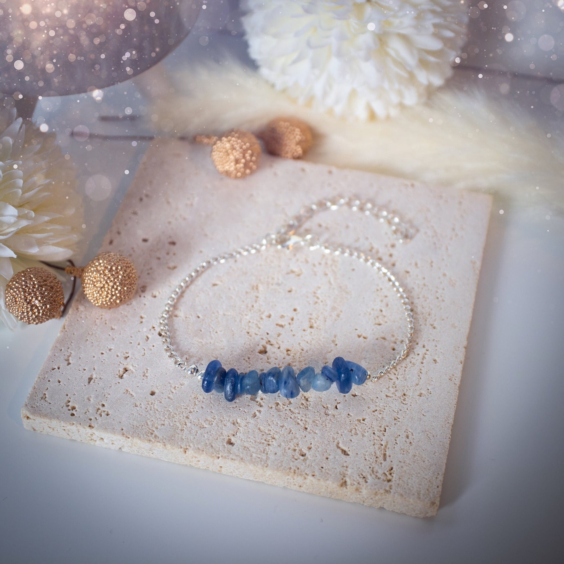 Silver plated, Kyanite bracelet. Featuring small, natural, deep blue kyanite crystal chips. The bracelet is 6.5inchs and comes with an extender. Beautiful and complimentary to any outfit or special occasion. Ideal Gift.