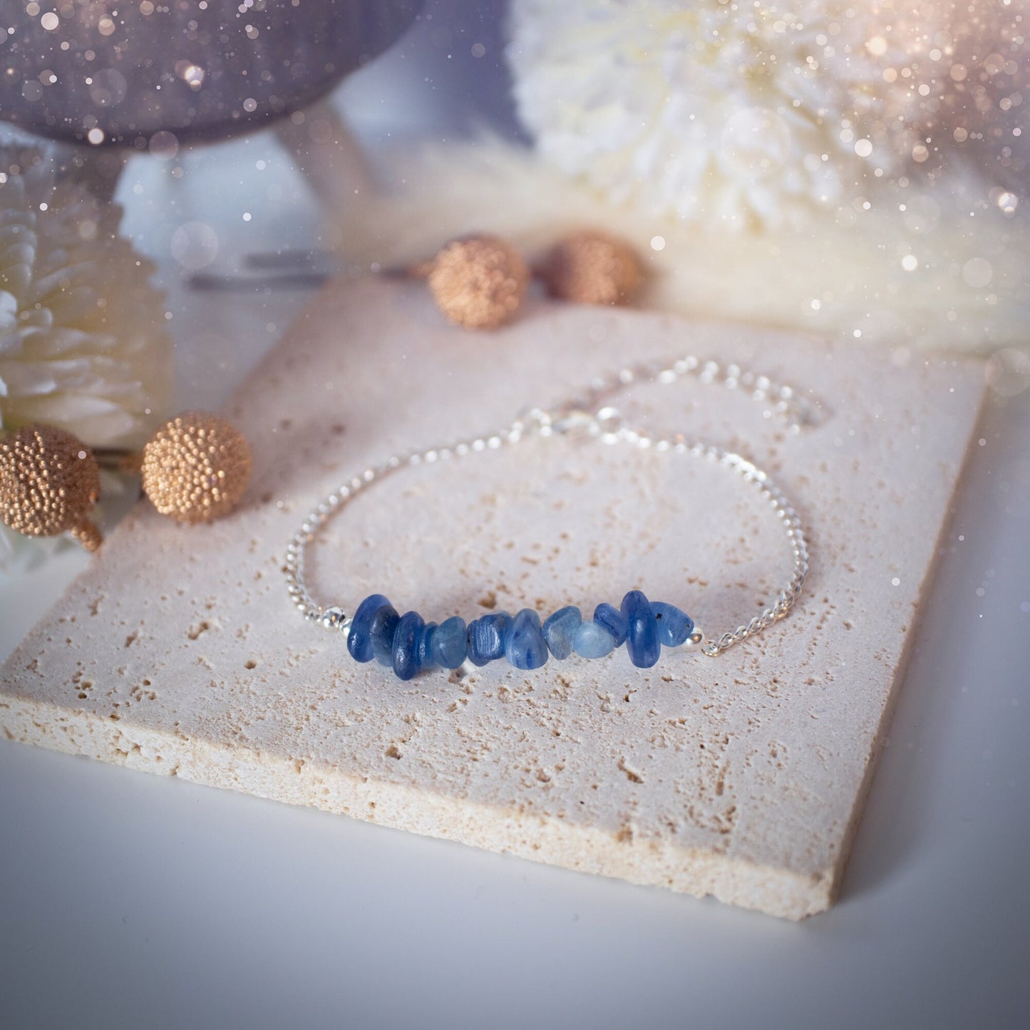 Silver plated, Kyanite bracelet. Featuring small, natural, deep blue kyanite crystal chips. The bracelet is 6.5inchs and comes with an extender. Beautiful and complimentary to any outfit or special occasion. Ideal Gift.