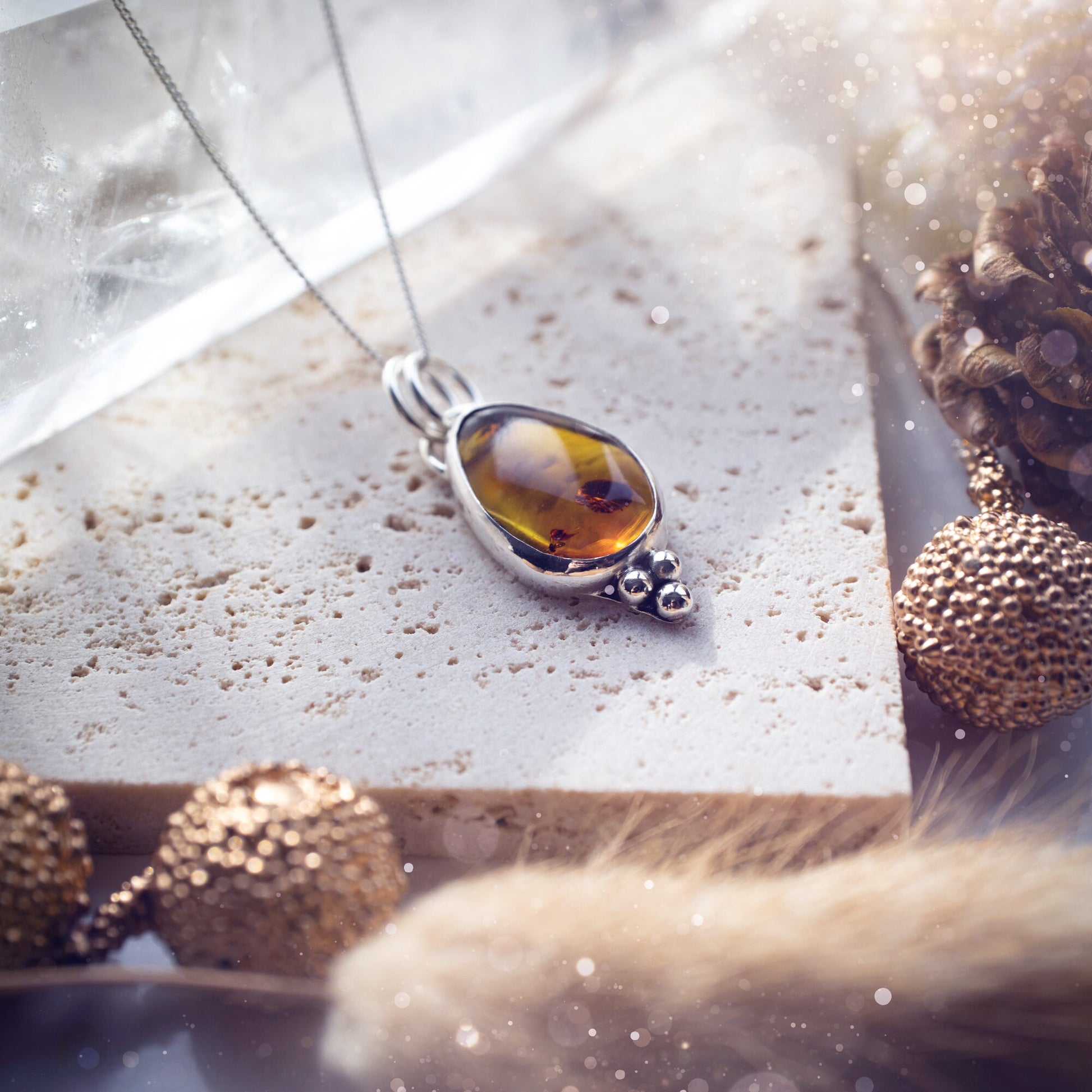 Beautiful, dainty, natural amber pendant necklace. Set in fine and925 sterling silver, this little pendant would make the ideal gift for any crystal gemstone lover. Full of hippy vibes and a one of a kind item.