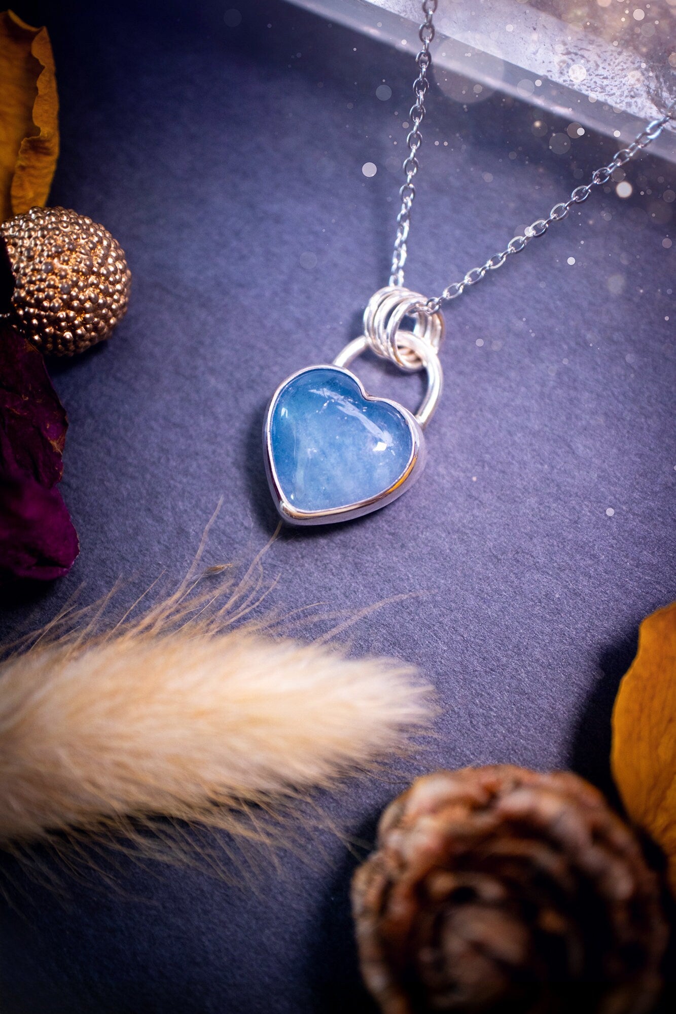 Bold and beautiful, blue aquamarine crystal heart pendant necklace. This pendant has been handcrafted out of fine and sterling silver. The piece is minimal yet unique. Suitable for jewellery gifts. Gothic, hippy and ideal for her. March birthstone