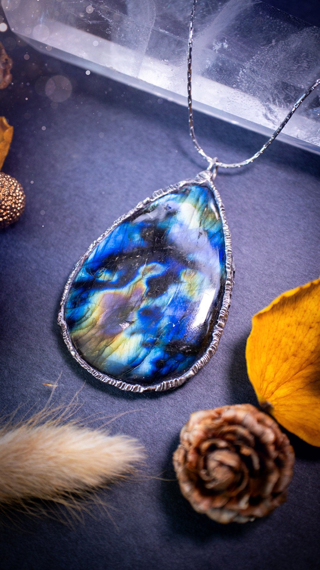 Beautiful, flashy labradorite crystal which has been soft soldered to create a stunning pendant necklace. Natural crystal gemstone with lead free solder, a beautiful gift for any crystal lover. Witchy and gothic style jewellery, gifts for her.