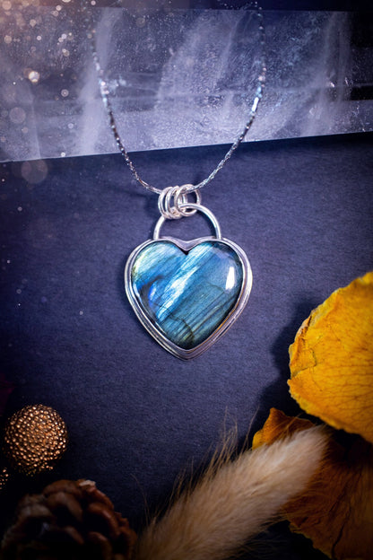 Bold and beautiful, blue and green flash, Labradorite crystal heart pendant necklace. This pendant has been handcrafted out of fine and sterling silver. The piece is minimal yet unique. Suitable for jewellery gifts. Gothic, hippy and ideal for her.